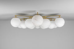 Lustre encastré Schwung Orion, modèle rond moderne en laiton et verre