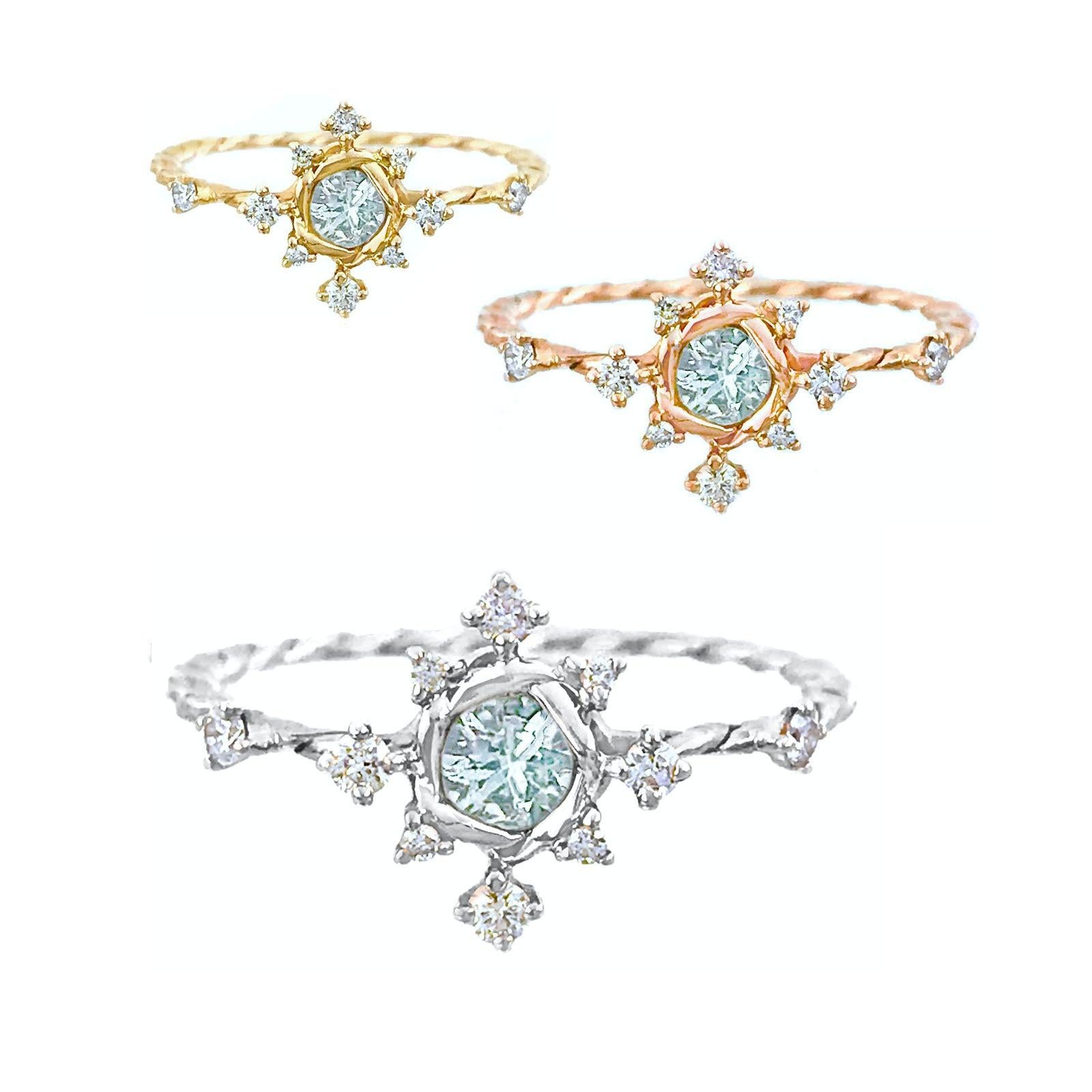 For Sale:  Scilla Aquamarine and Diamond Star Twist Ring 18 Karat 11
