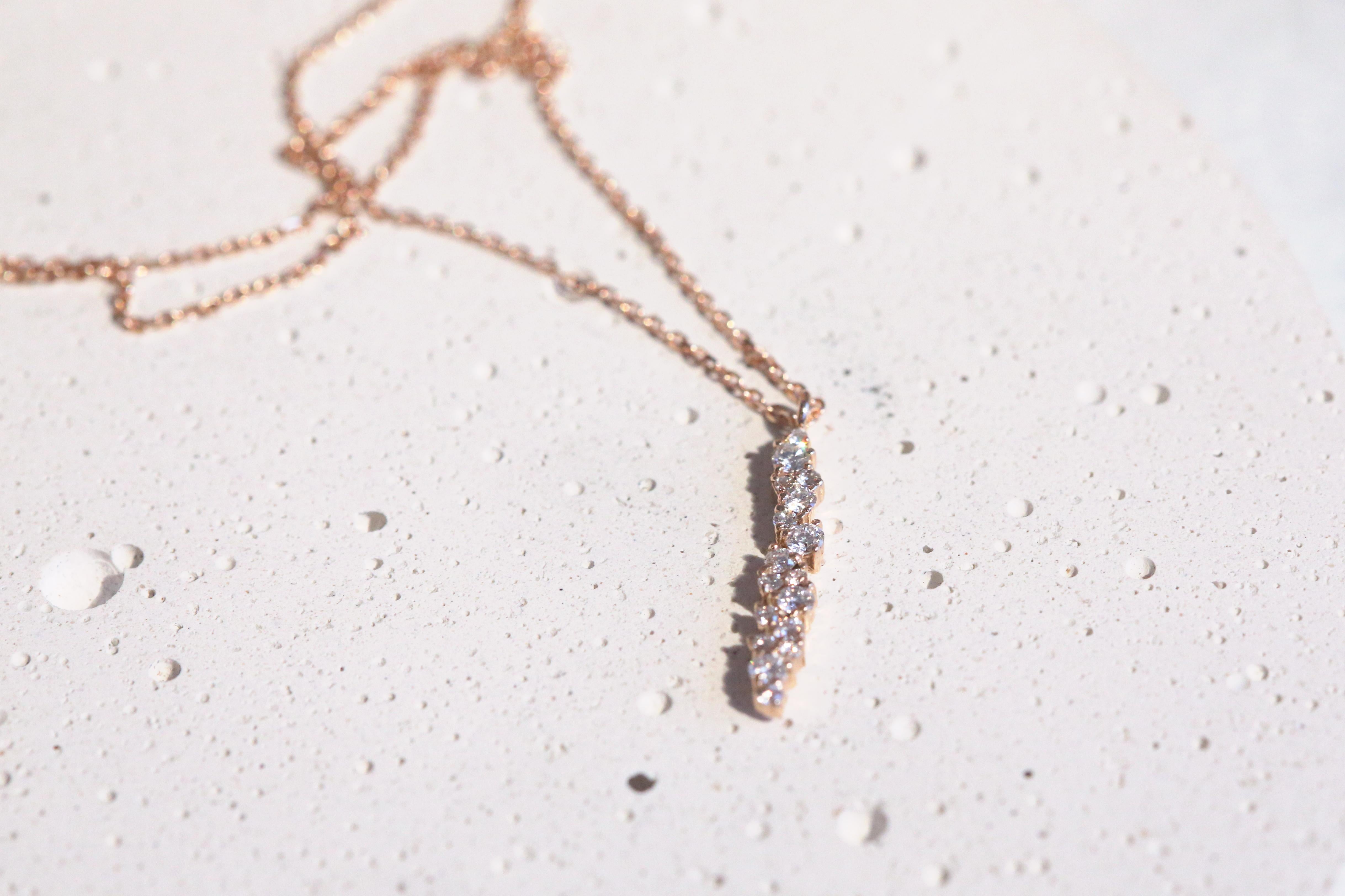 The Drop Diamonds necklace features 0.37ct of white diamonds set in 18k gold.