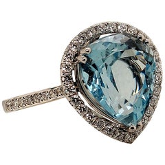 Scintillating Pear Shape Aquamarine with Diamond Halo Ring