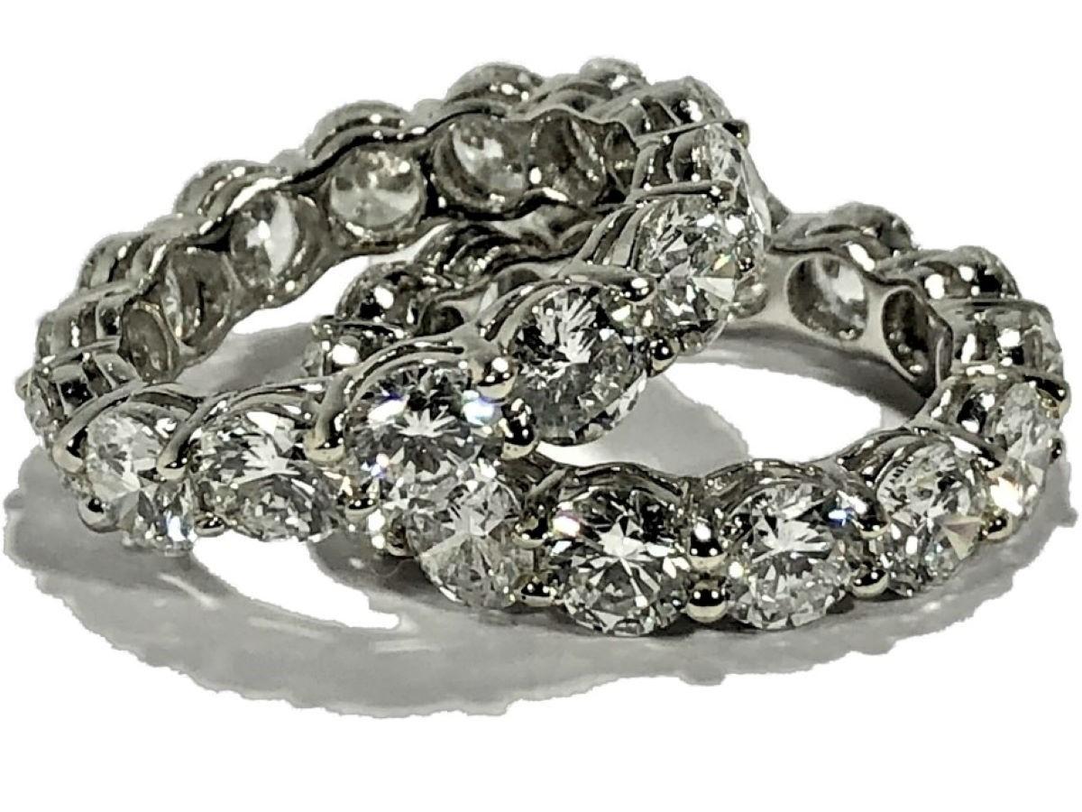Contemporary Matched Pair of Platinum Common Prong Set Eternity Bands 11.86Ct Total Weight