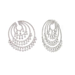 Scintillating 18K White Gold Circle Earrings with 6.7 Ct Dangling Diamonds