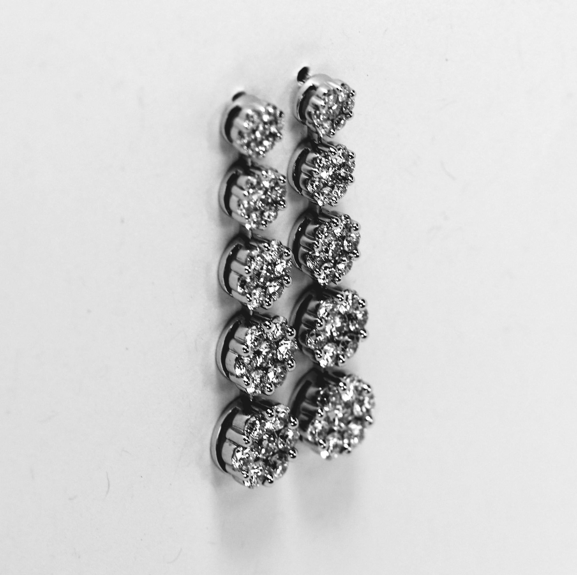 Modern Scintillating White Gold Graduated Floret Diamond Dangle Earrings