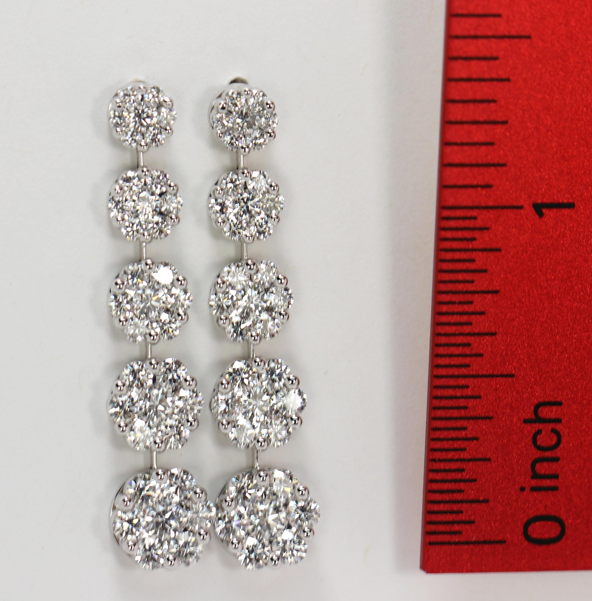 Scintillating White Gold Graduated Floret Diamond Dangle Earrings In Excellent Condition In Palm Beach, FL