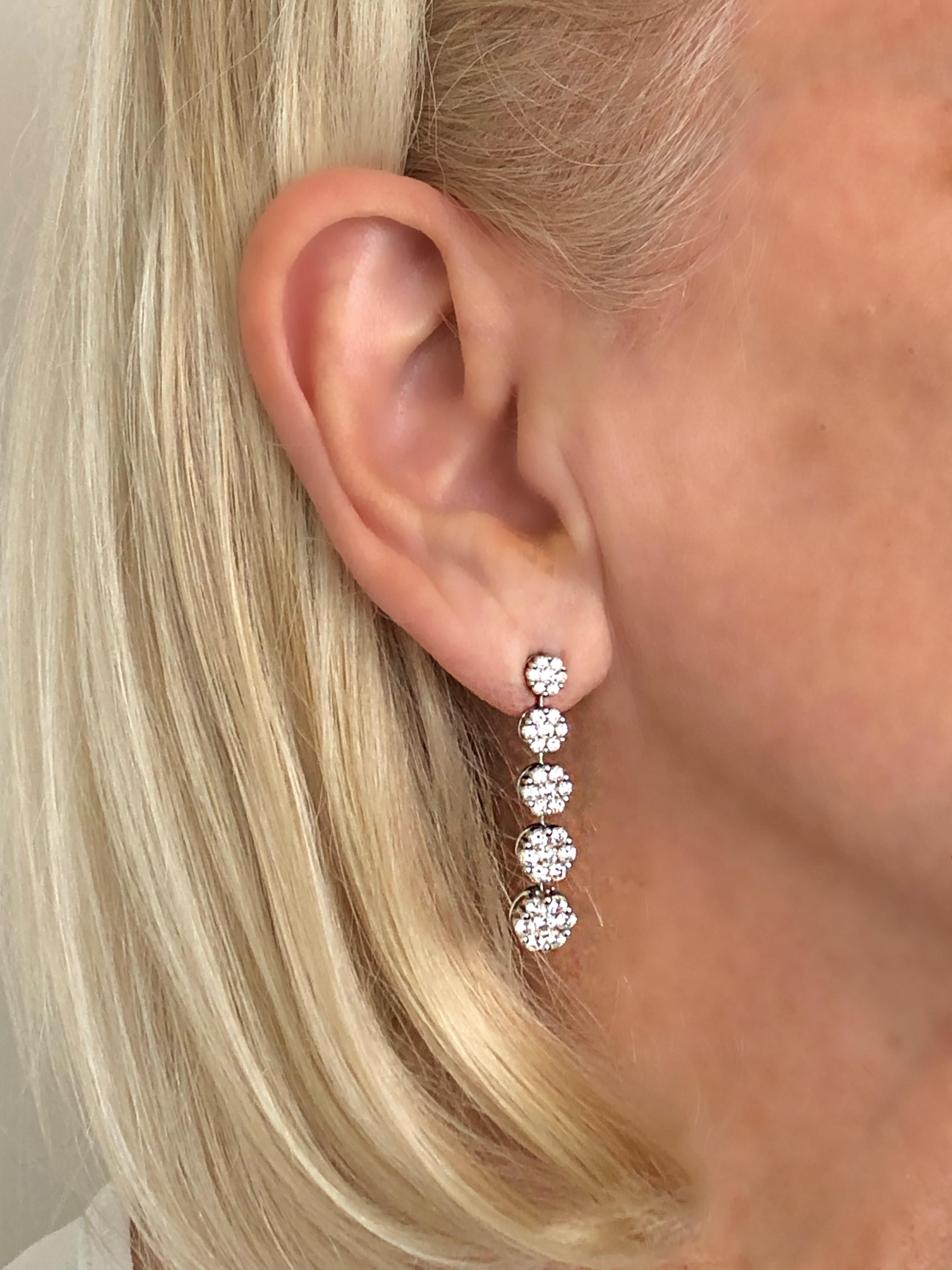 Scintillating White Gold Graduated Floret Diamond Dangle Earrings 1