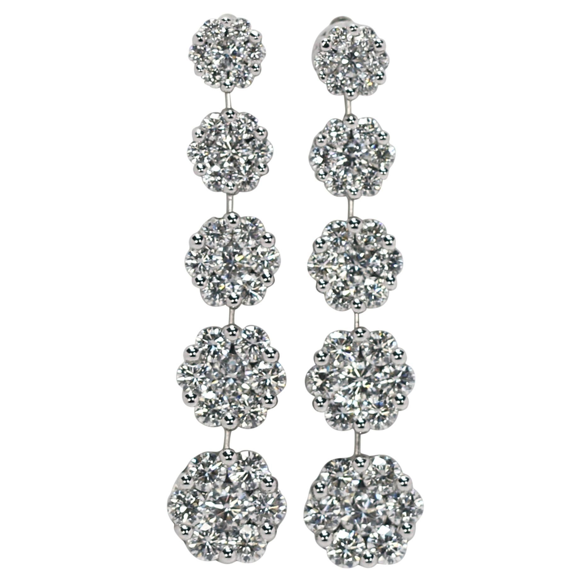 Scintillating White Gold Graduated Floret Diamond Dangle Earrings