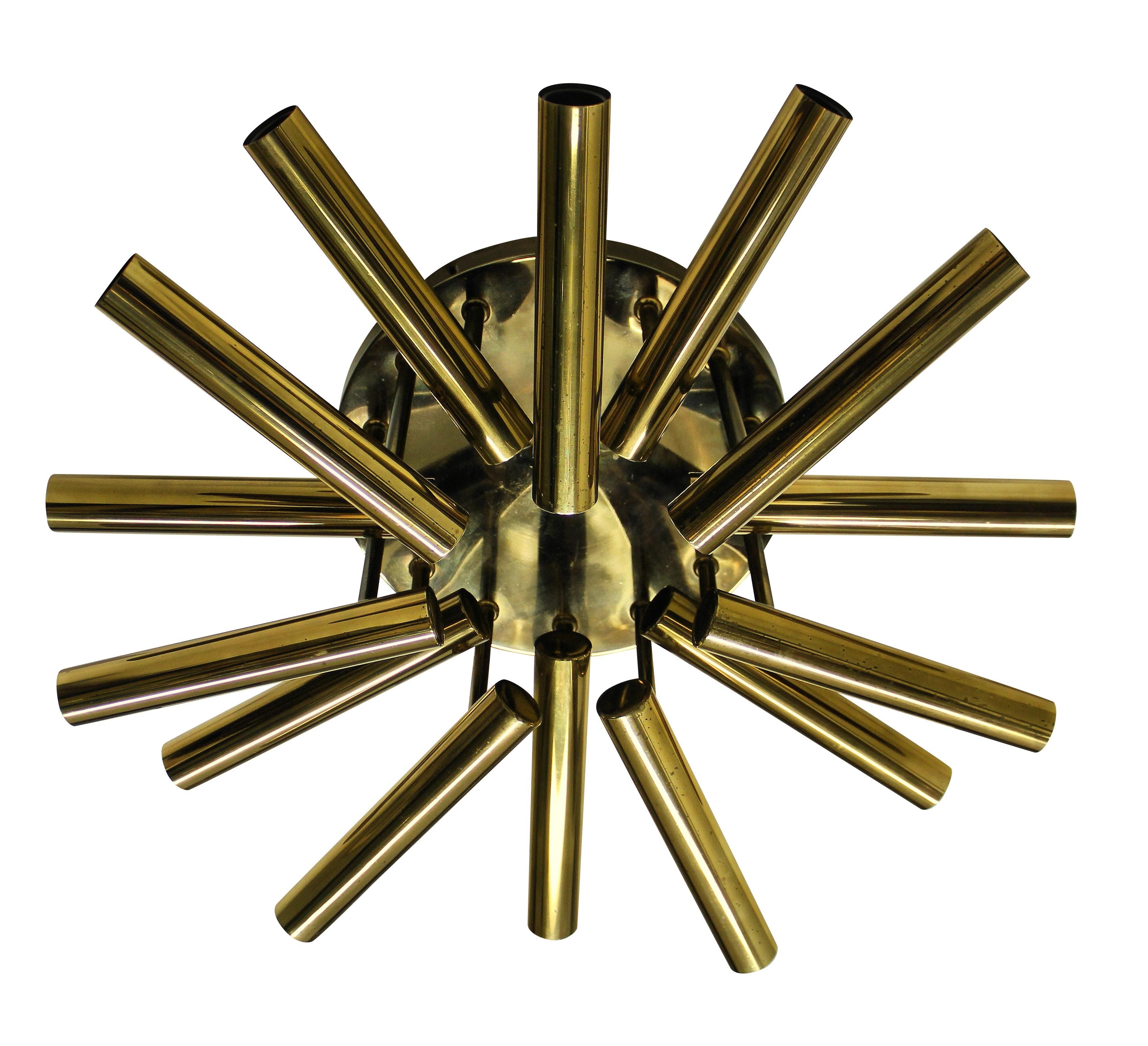 A Sciolari ceiling light in gilt brass, with fourteen adjustable lights.