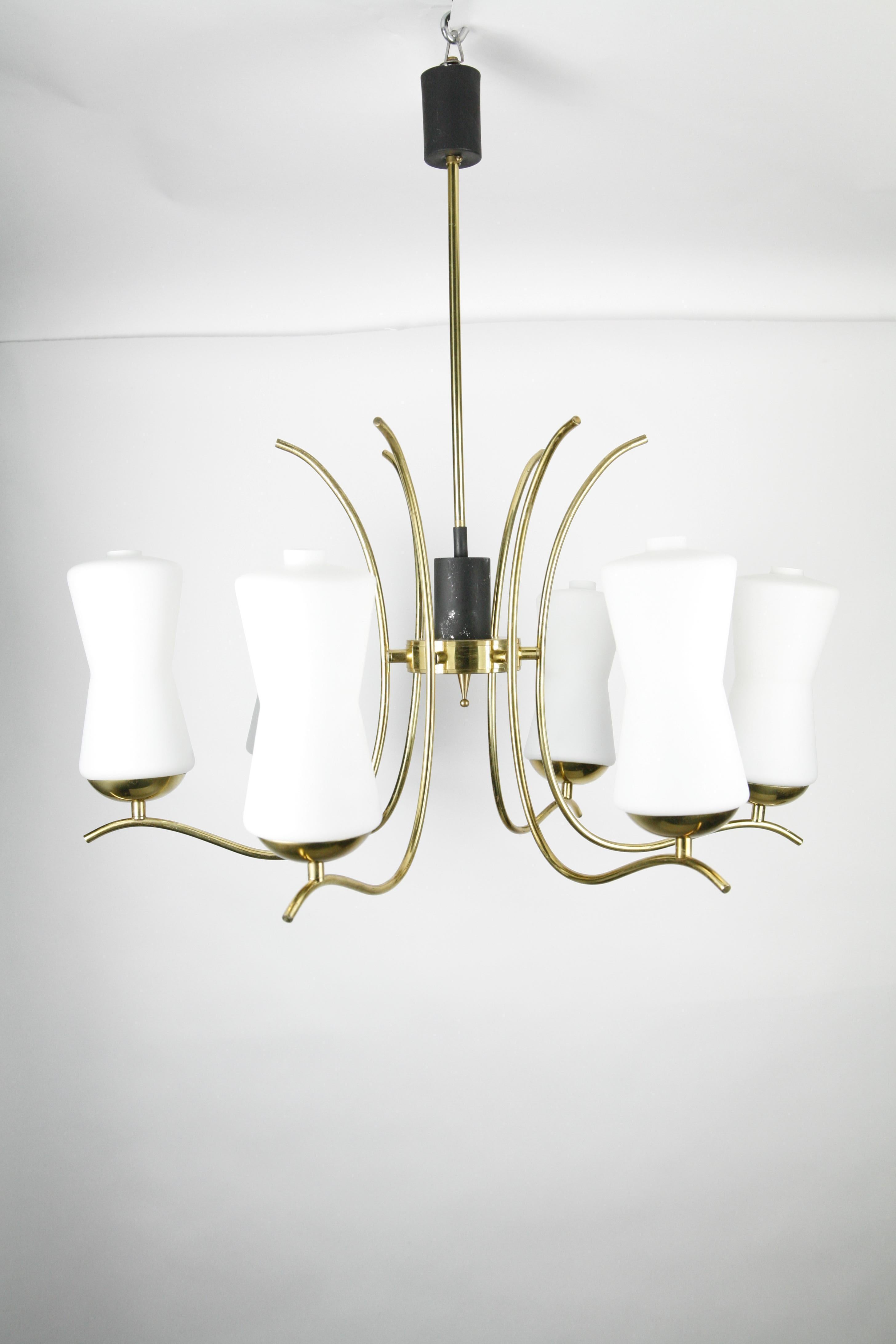Stilnovo mid 20th century 1960s brass-plated frame that has a matte black canopy to the ceiling and a similar canopy on the stem which gives great symmetry not to mention a very chick look with 7 individual opaline glass shades that measure 7.7