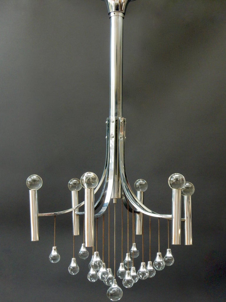 Midcentury chrome frame chandelier by Gaetano Sciolari with glass globes suspended by thin chains. Six bulbs hang downward.