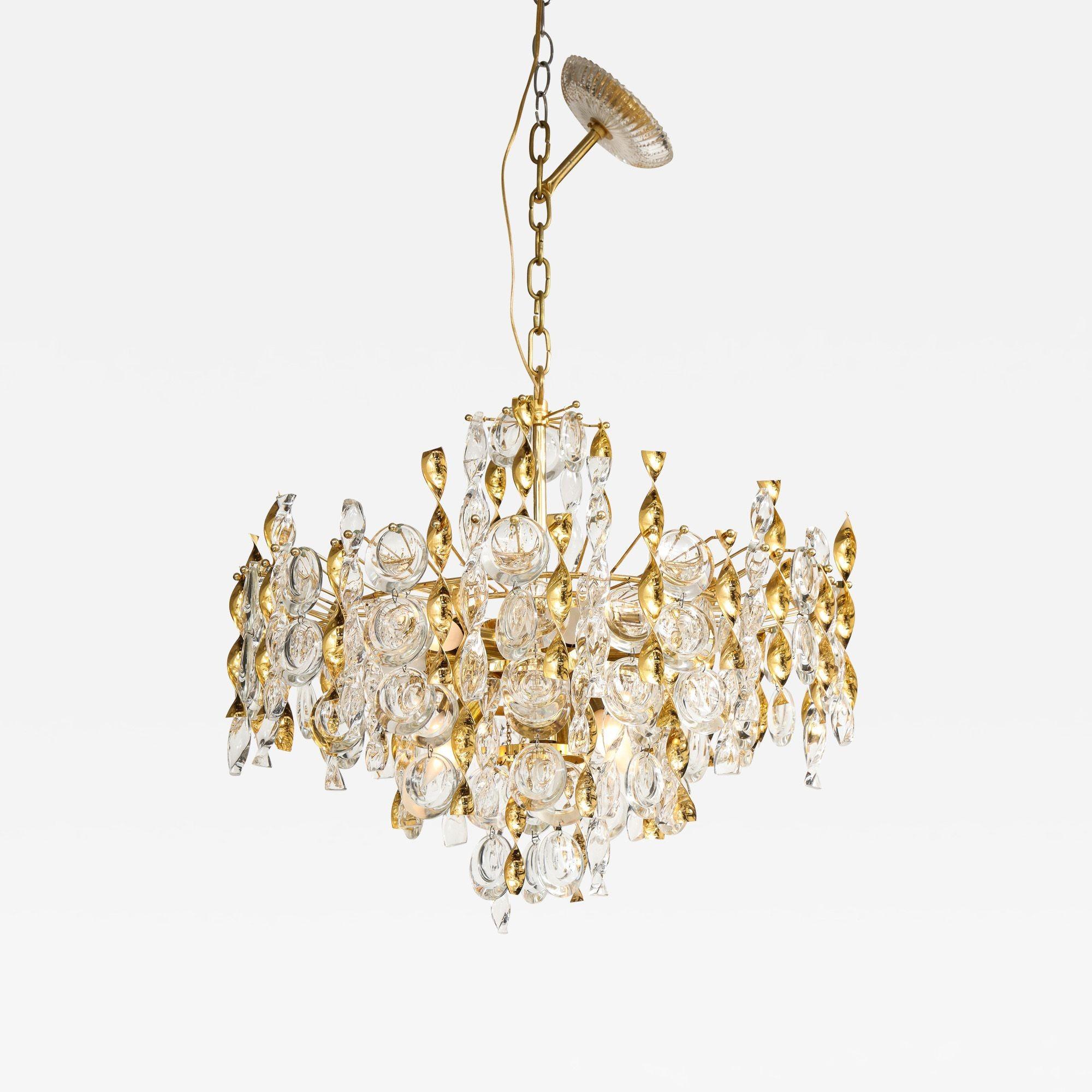 A fabulous jewel-like Gaetano Sciolari pendant chandelier with crystal lens pendants and glass and gold plated brass twists.