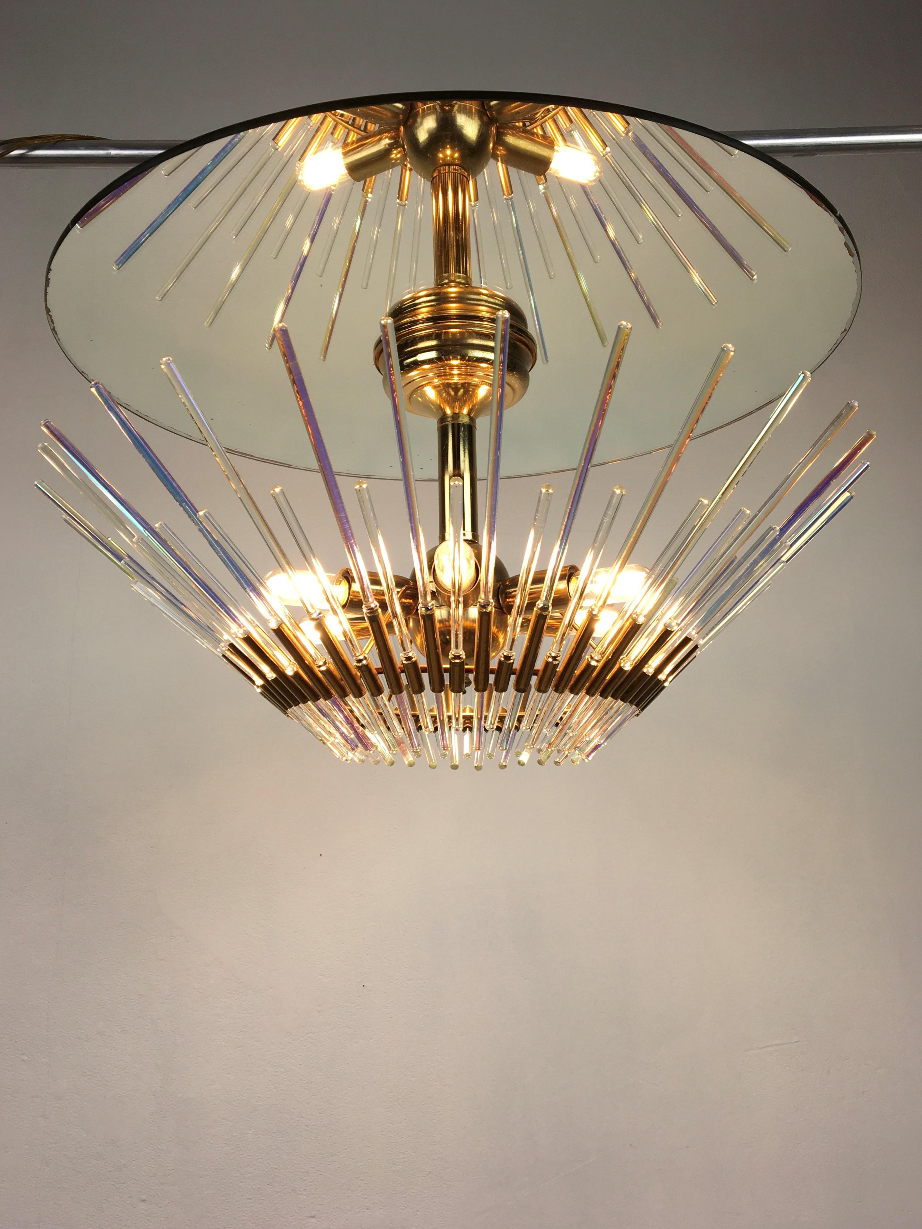 Sciolari flush mount with mirror glass, crystal glass rods and brass.
This vintage Sciolari flush mount - Sciolari chandelier has 2 different sized of crystal glass rods which can be placed in the brass base: 7.48 inch and 11.42 inch or 19 cm and