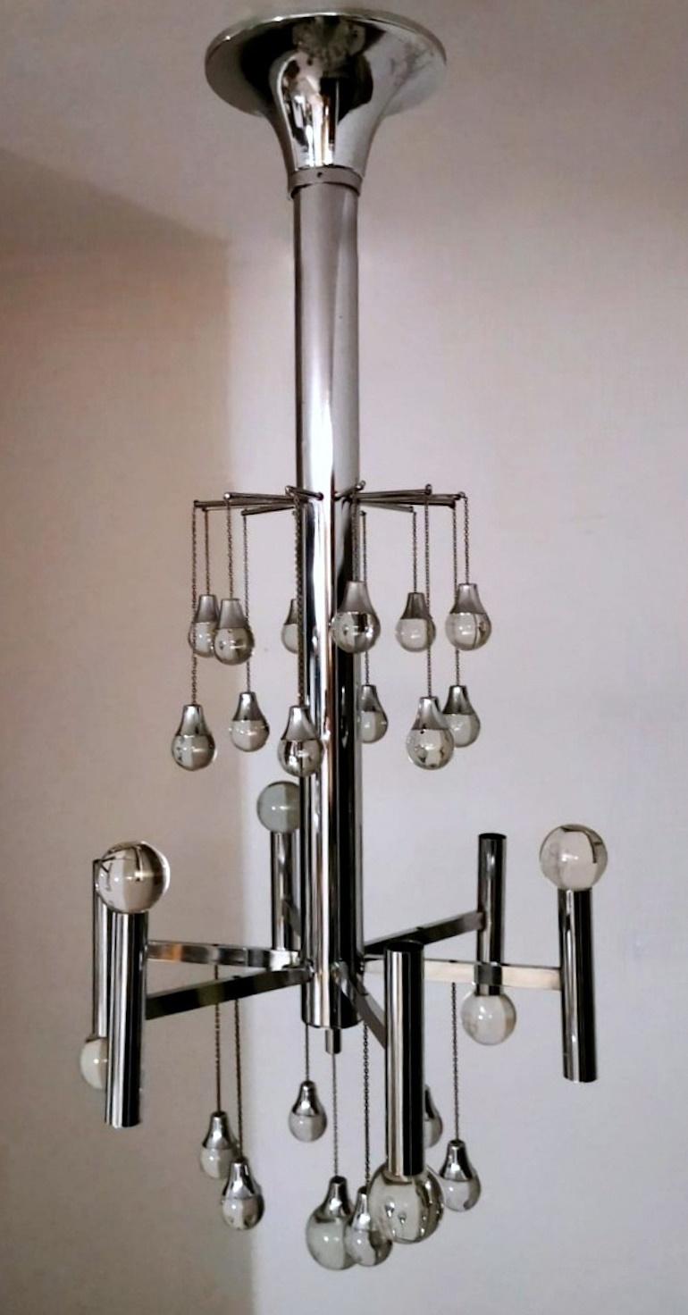 We kindly suggest you read the whole description, as we try to give you detailed technical and historical information to guarantee the authenticity of our objects. Original and very special chandelier made in Space Age style; the whole architecture