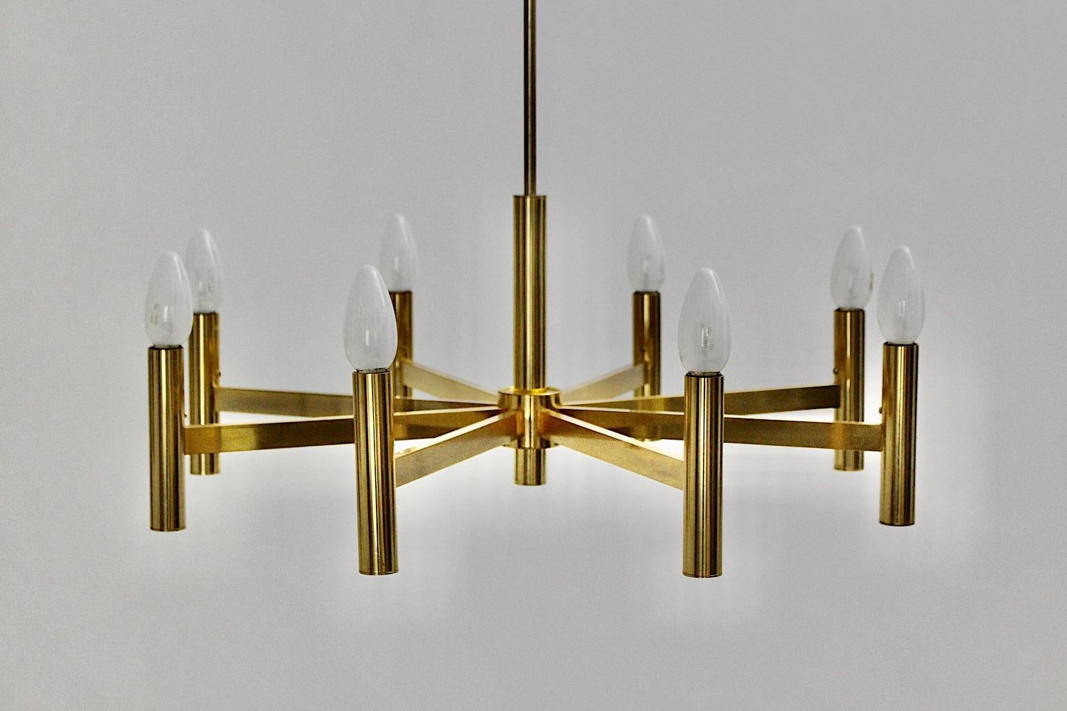 Gaetano Sciolari vintage golden metal Mid-Century Modern chandelier designed 1960s, Italy.
Gaetano Sciolari came from a family, who designed and manufactured lightings.
He was famed for lightings in futuristic and sculptural metal designs.
This