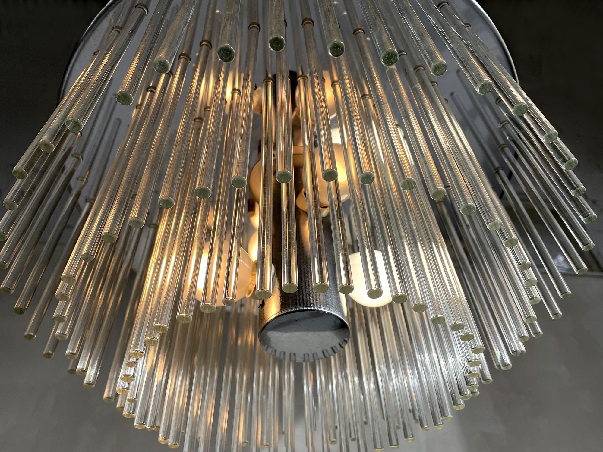 Ceiling lamp signed Sciolari in chromed metal and glass tubes, Italy 1970. The perforated plate receives 150 transparent glass tubes, terminated at the upper end by a ball. There are three sizes of tubes, allowing them to be arranged as desired. The