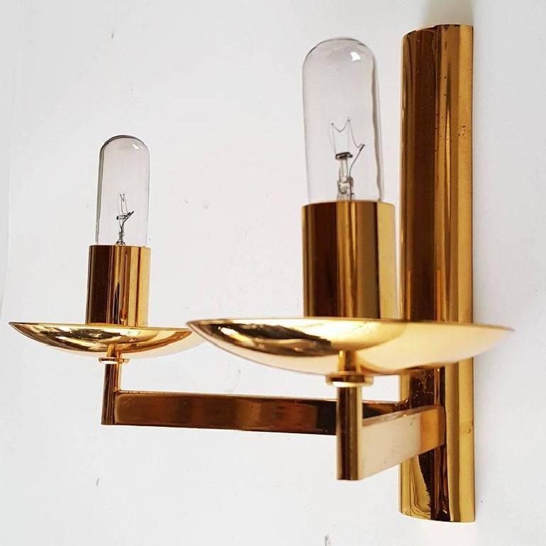 Nice two-arm Sciolari pair of sconces. Three pair available. Priced by pair two light, 75 watt max per bulb.
   