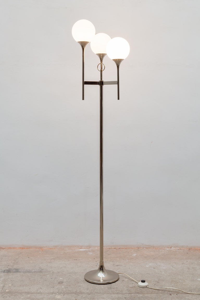 Mid-Century Modern Floor lamp with three milk glass globes and chrome base designed by Gaetano Sciolari 1970s, Italy. The floor lamp create a warm light and has a timeless design. In original perfect condition. Dimensions: Floor Lamp: 40 W x 155 H x