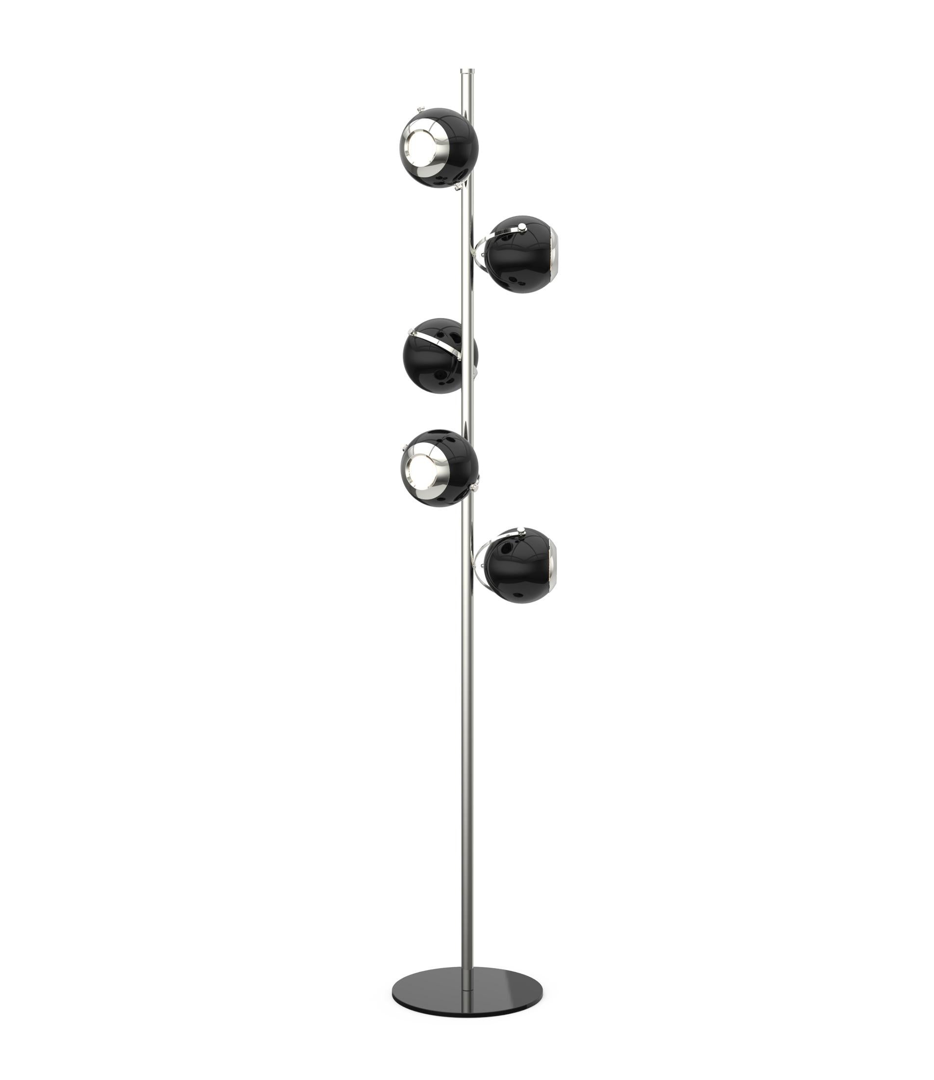 Scofield is an unusual floor lamp with five chrome lights all supported by a white brass base. Each light and bracket rotate separately allowing different light focuses. The Mid-Century Modern floor lamp has round lamp shades in aluminum, that can