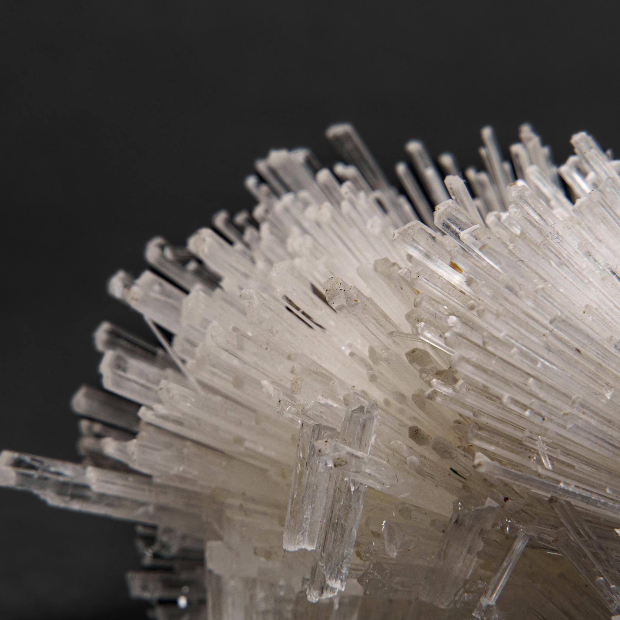 From Nasik District, Maharashtra, India

Large lustrous cluster of an acicular sprays of scolectite crystals on pink stilbite. The scolecite crystals have glassy crystal faces and are mostly translucent to transparent at the terminations.


Weight: