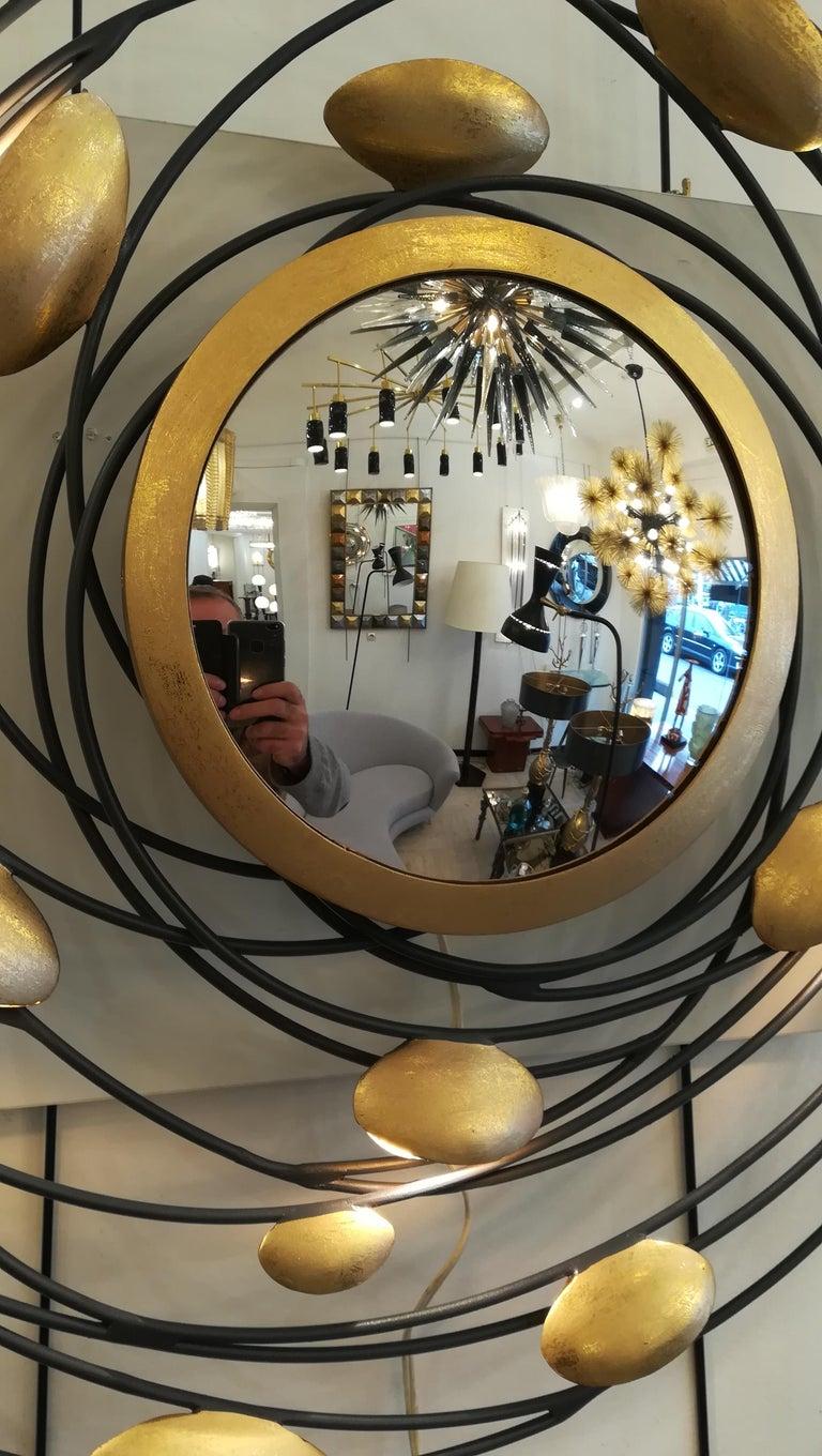 French Sconce and Mirror Illuminated by Lightning Gold Shells For Sale