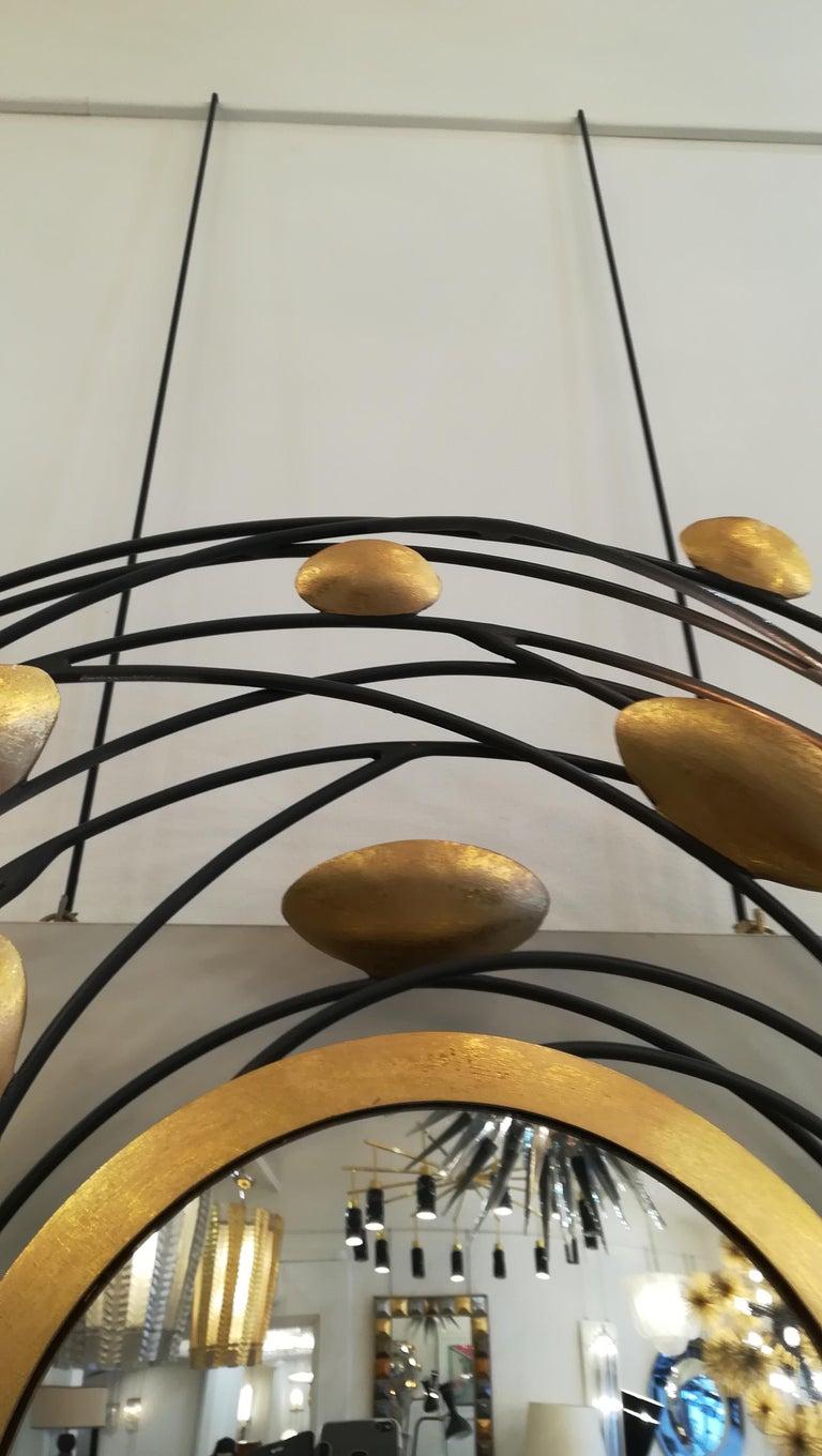 Contemporary Sconce and Mirror Illuminated by Lightning Gold Shells For Sale