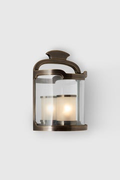 Sconce carved in bronze with glass
