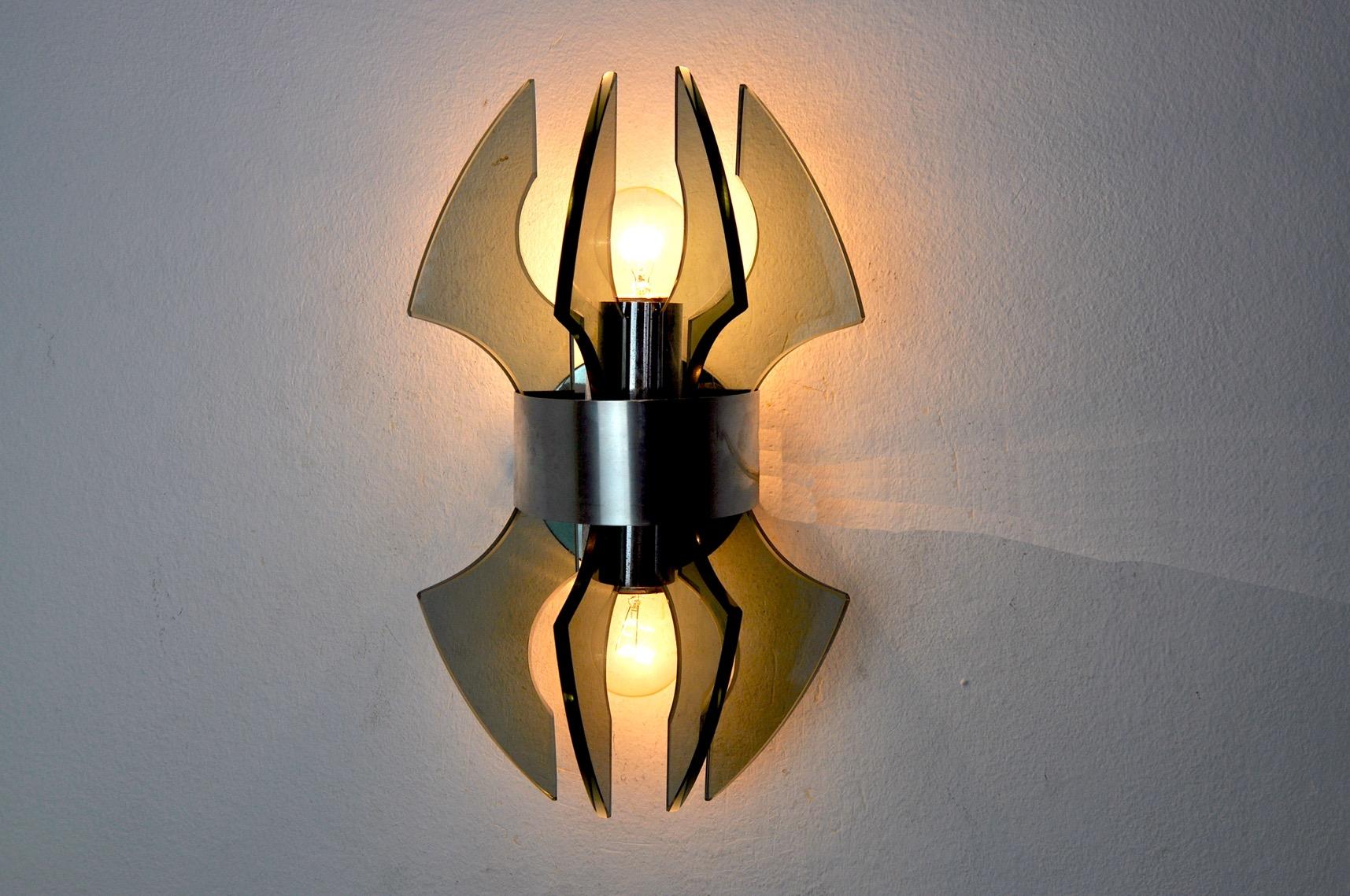 Beautiful and rare wall lamp veca produced in Italy in the 70s. Wall lamp made of murano glass crystals. Chromed metal structure. Unique object that will illuminate wonderfully and bring a real design touch to your interior. Electricity verified,