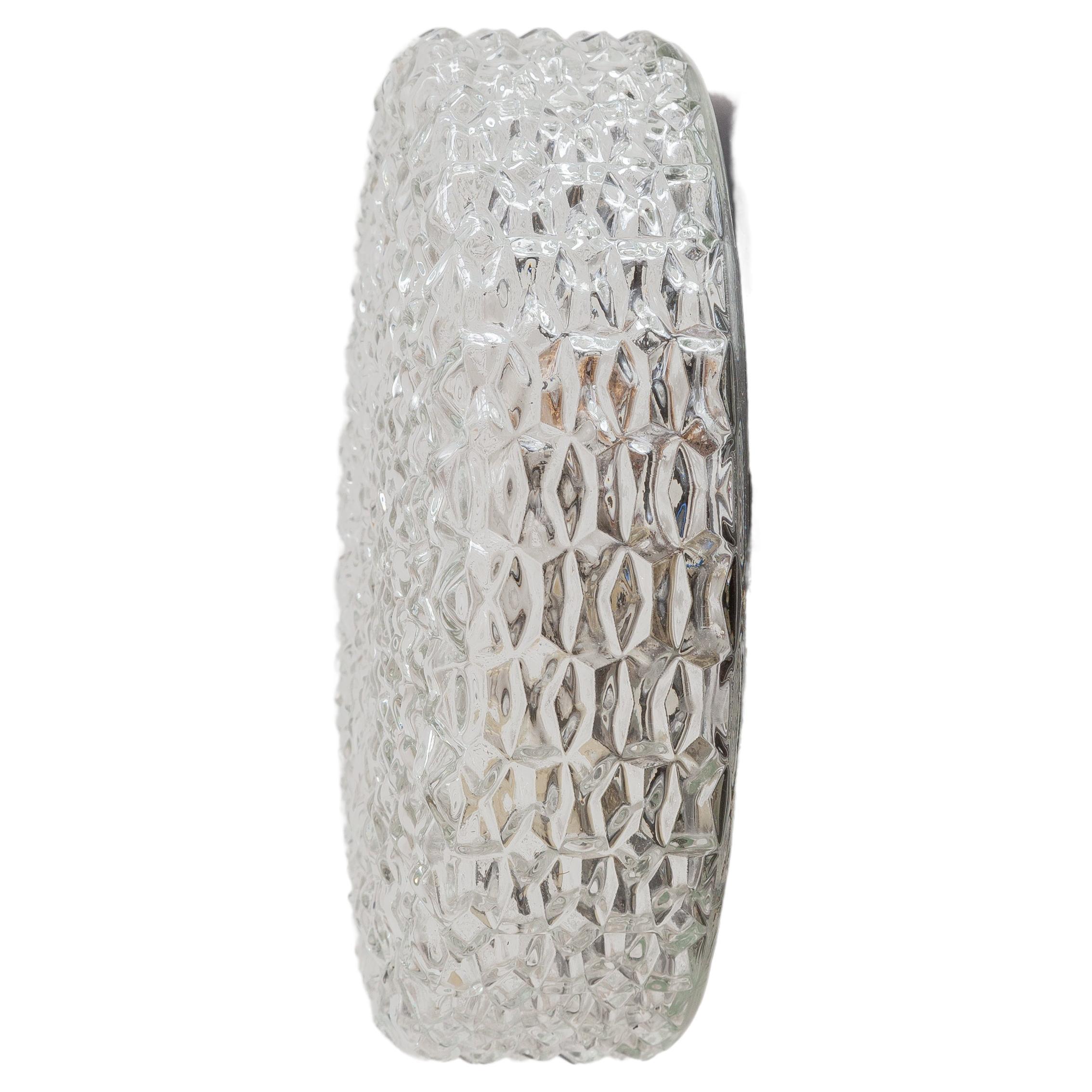 Vintage flush mount light by Limburg, Germany. It can be used as a wall sconce or ceiling lamp. Textured glass shade on a circular brown base. This quantity is rare to find. 

20 pieces available.