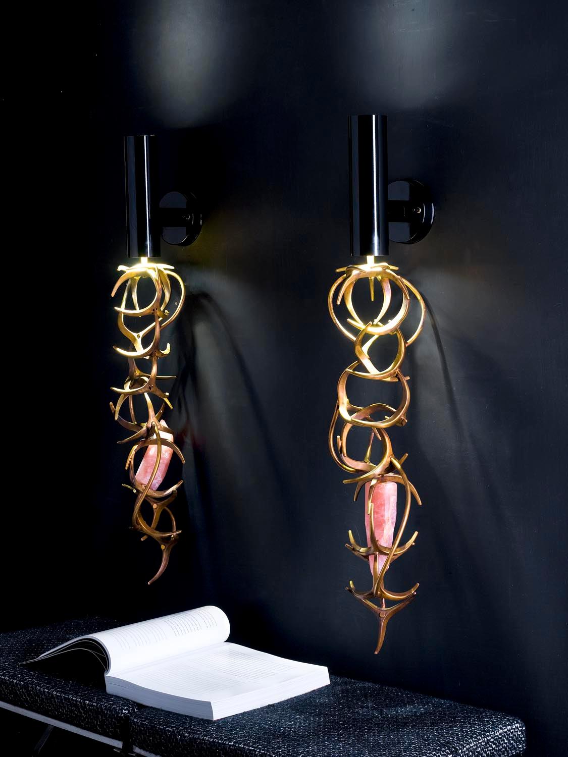 Wall lamp in hand soldered bronze, natural finished. Rose quartz stone. Glossy-black varnished brass upper part.