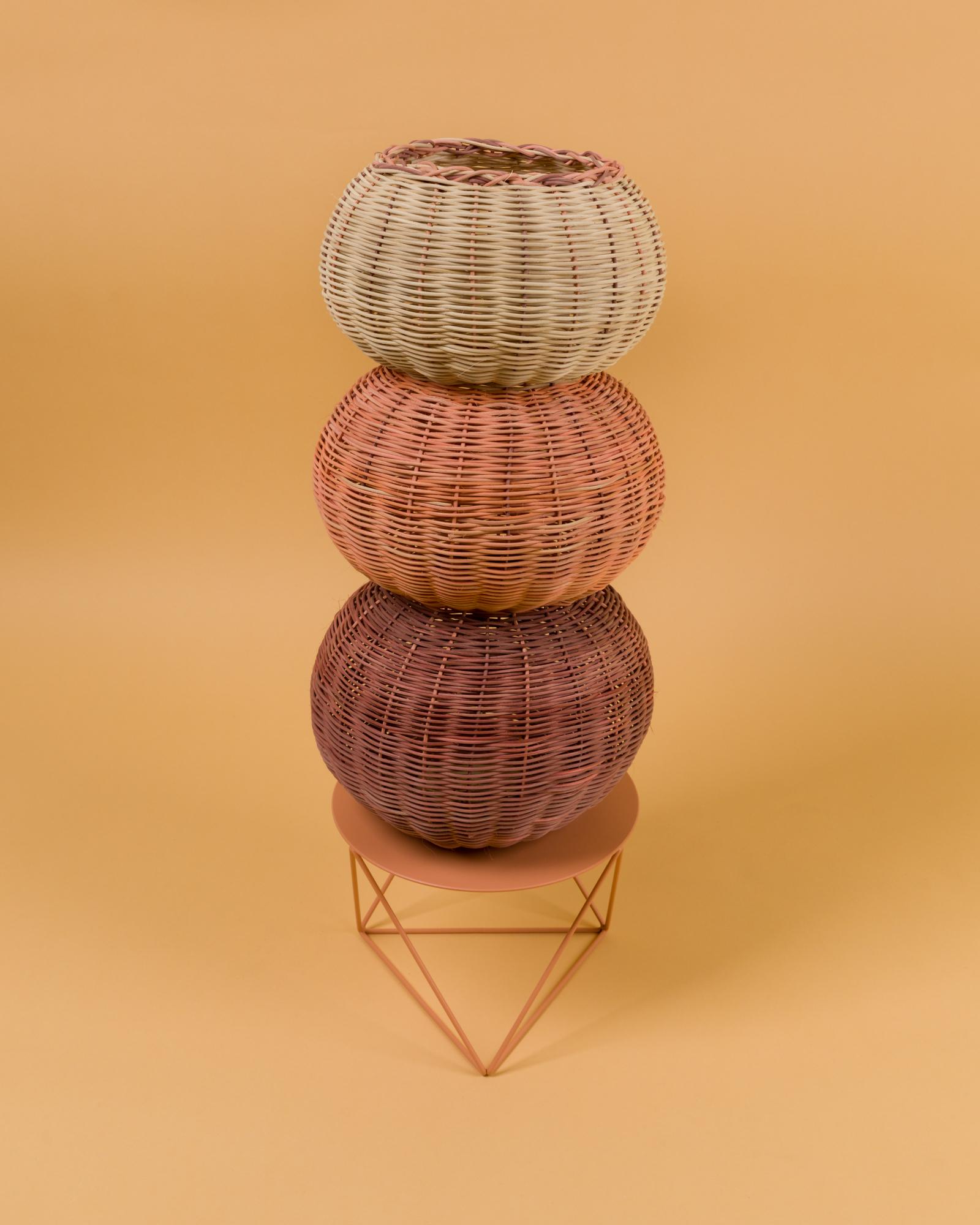 The scoops woven vessel is hand dyed and woven with reed in our Chicago studio. Inspired by forms in ancient Greek ceramics, the material language of this vessel brings together the rich craft history of weaving with 3 dimensional form.

Measures: