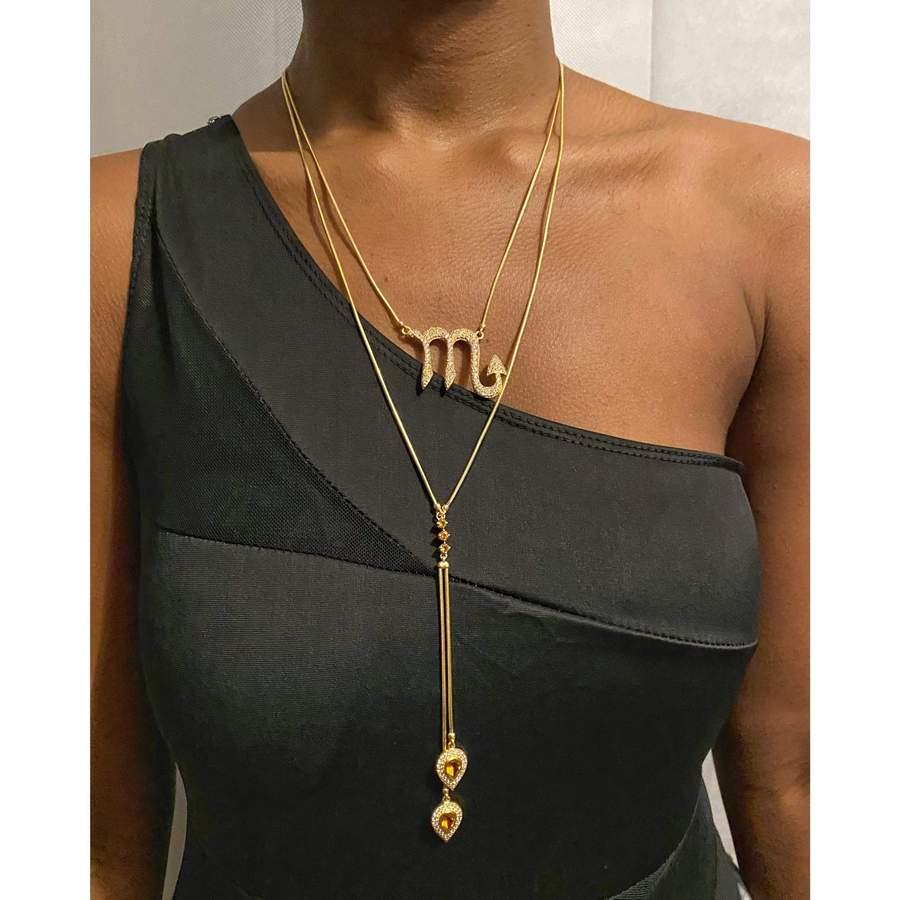 November has a gold birthstone. Yellow Topaz is symbolized to confidence, joy, and healing. This necklace features a Scorpio Zodiac pendant with a detachable necklace that can be styled in 3 different ways.
