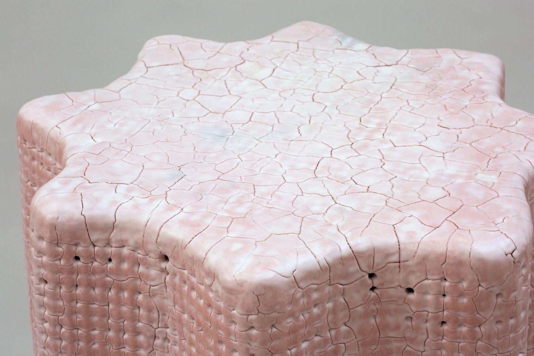 Scalloped side table by Scott Daniel Design.

MATERIALS
Pink Clay, White Glaze, Metal

DIMENSIONS
21” W x 23” H Dimension variations occur naturally, +/- 1”
Custom dimensions available

PROCESS
Inspired by the concept of Alchemy –