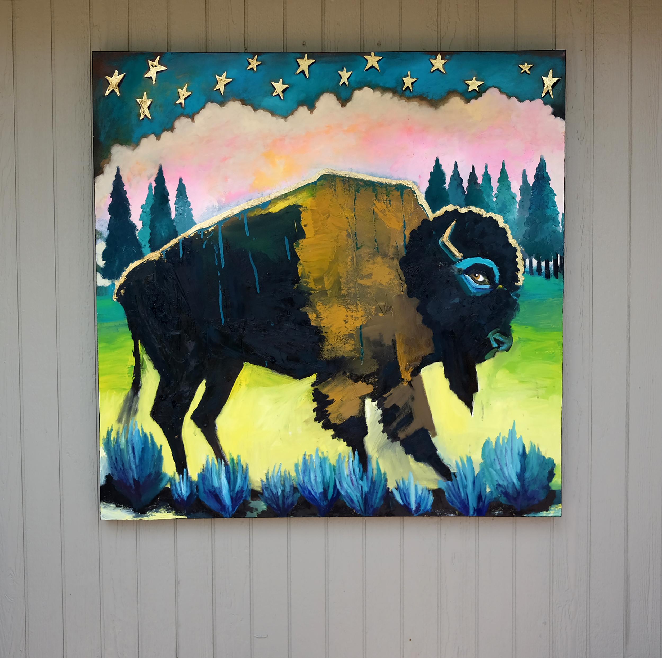 <p>Commenti dell'artista<br />Un bisonte robusto si erge in un paesaggio vibrante e onirico. Strati di marrone aggiungono calore alla sua pelliccia dai toni scuri, mentre vivaci pennellate di blu intorno all'occhio le conferiscono una presenza