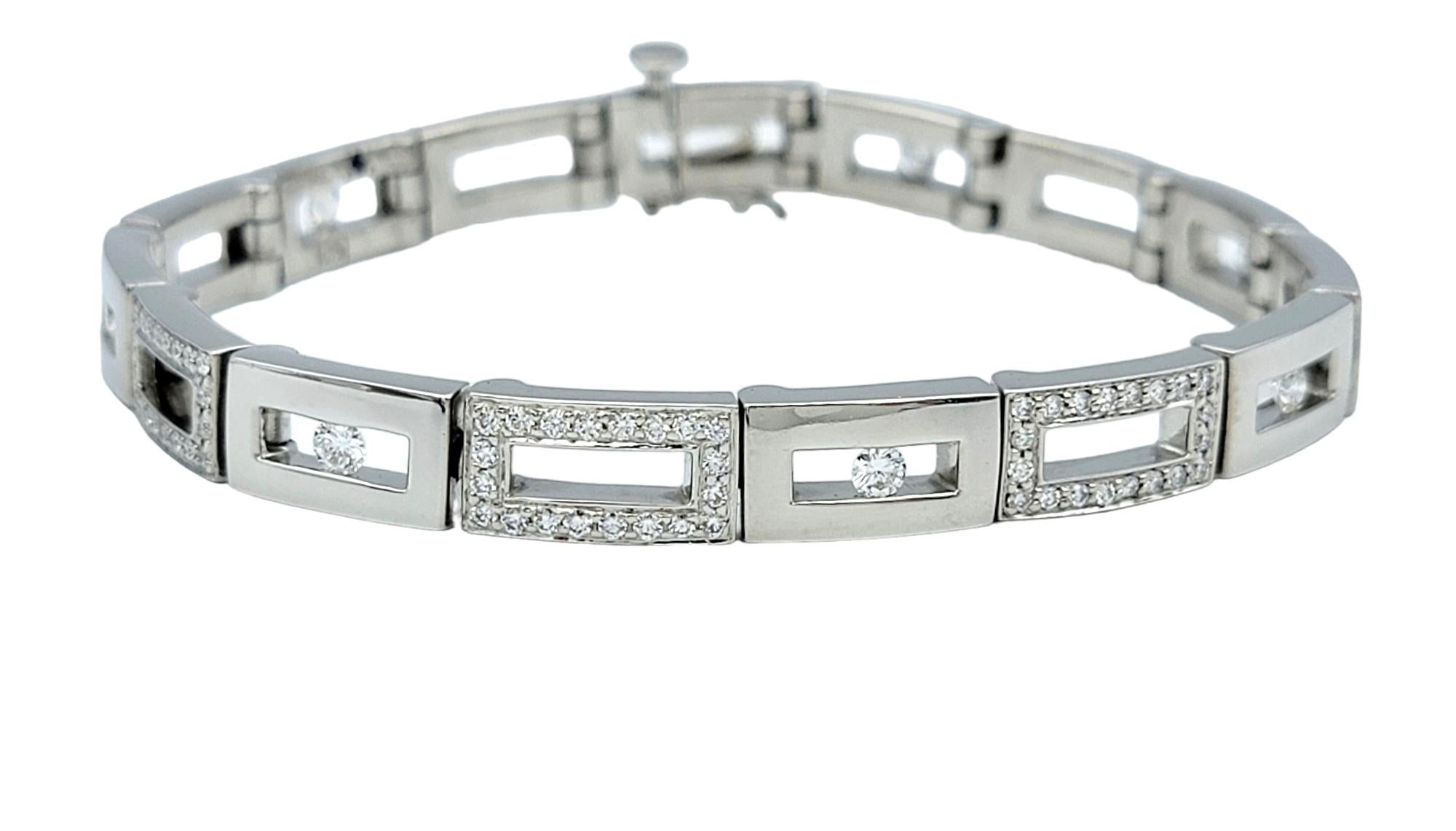 This exquisite Gauthier chain link bracelet is a stunning blend of elegance and contemporary design. This luxurious piece features alternating links of pave and tension set diamonds, creating a dazzling display of brilliance and sophistication.

The