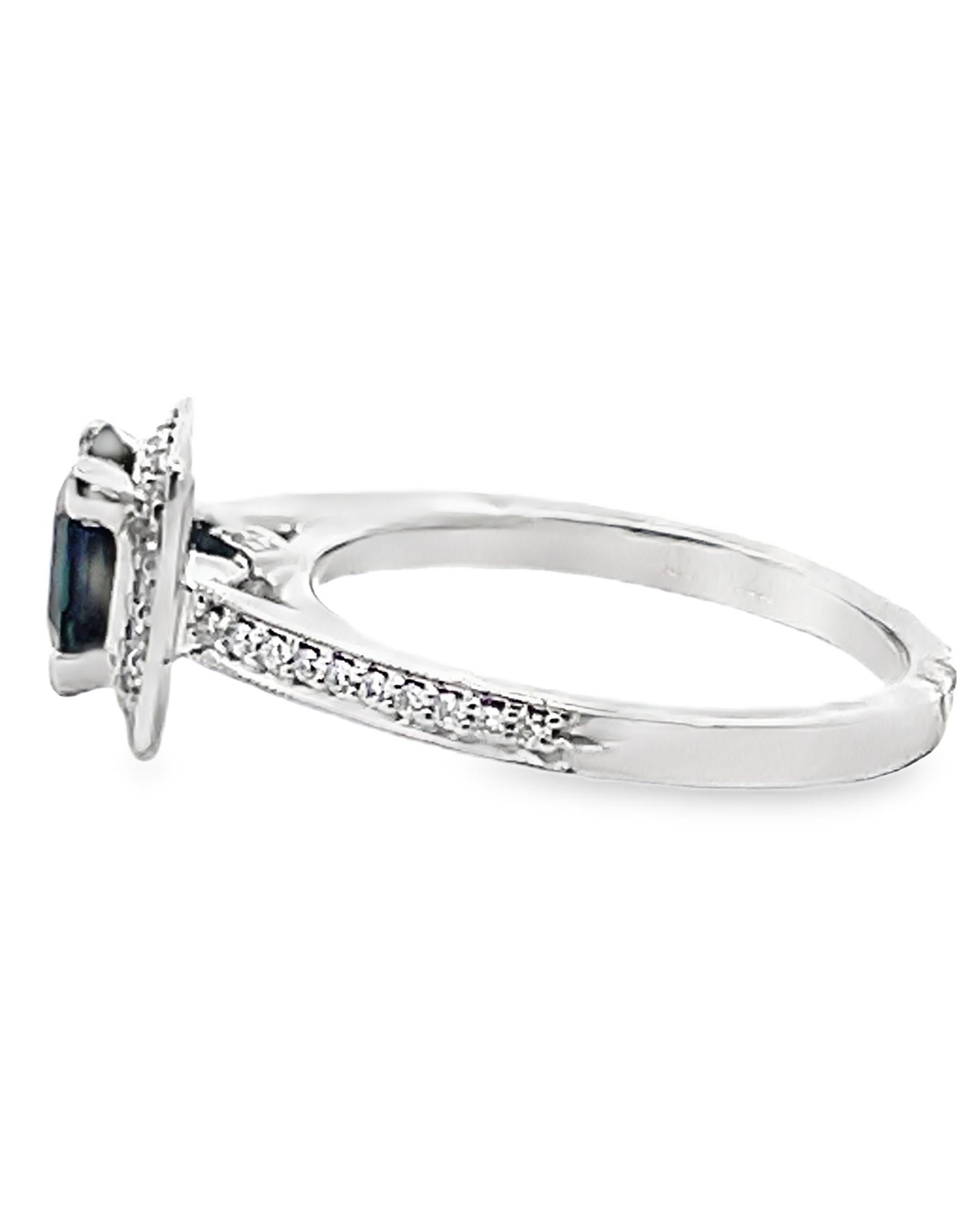 14K white gold Scott Kay 'contemporary' engagement ring with 0.22 carat diamonds.  In the center, there is one square shape dark blue sapphire weighing 1.31 carats. 

- Finger Size 6.75
- Diamonds are H color, VS2/SI1 clarity