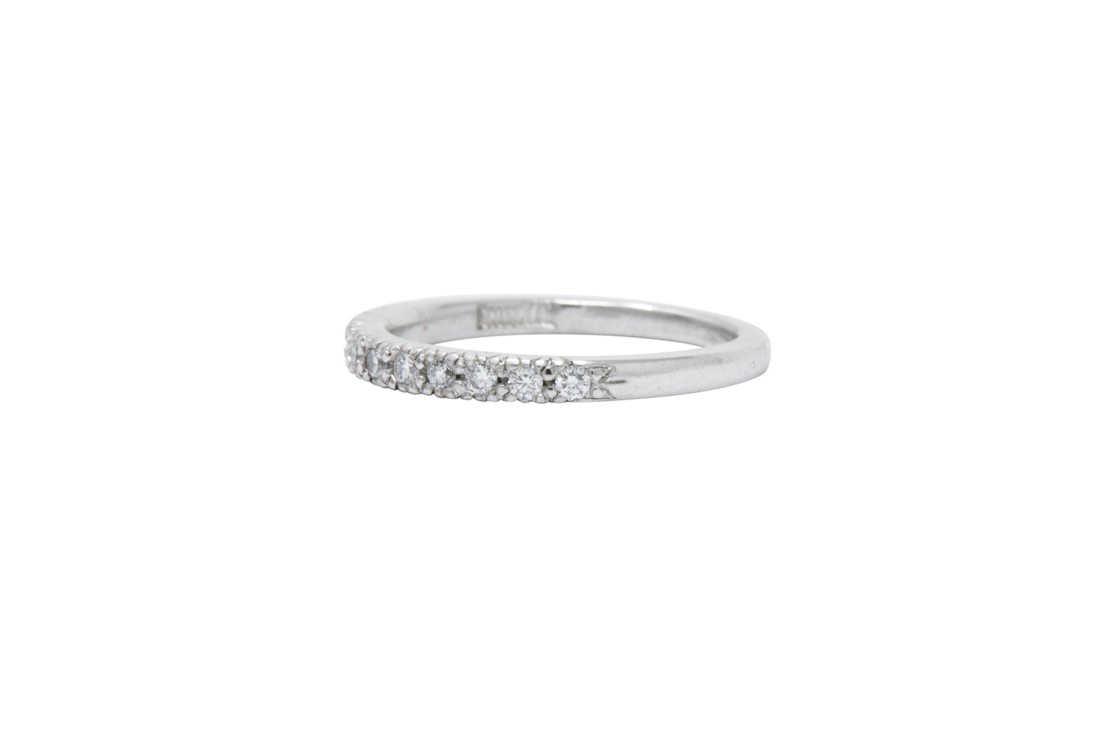 Set to the front with round brilliant cut diamonds, approximately 0.25 carats total, G/H color, VS to SI clarity, bead set

Fully signed Scott Kay

Ring Size: 5 & Sizable

Top measures 2.1 mm wide and sits 2.0 mm high

Total Weight: 2.9