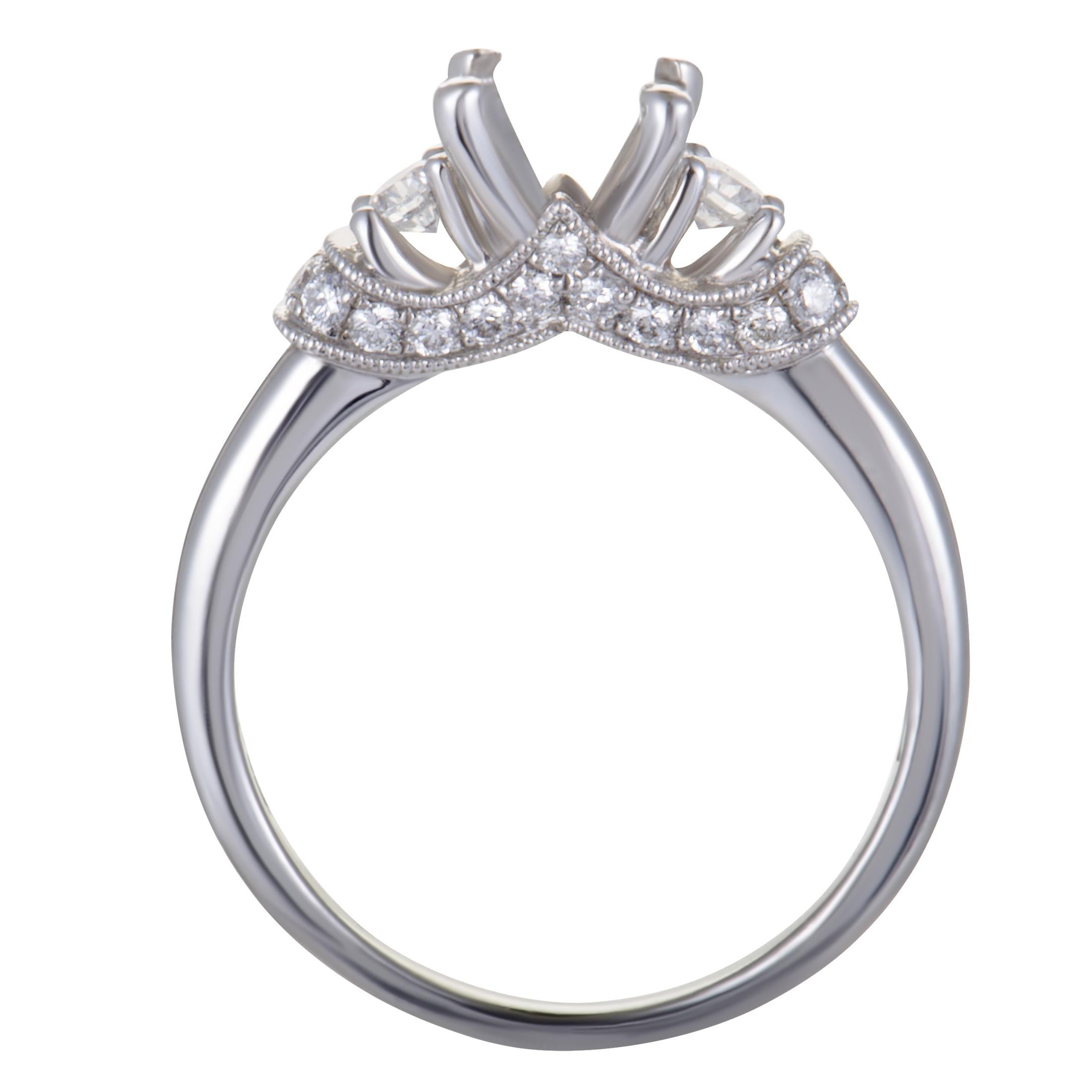Presented by Scott Kay, this superb mounting ring is made of classy 14K white gold and features a wonderfully refined design. The ring is embellished with sparkly diamonds that weigh in total 0.38 carats.
 Ring Top Dimensions: 14mm x 6mm