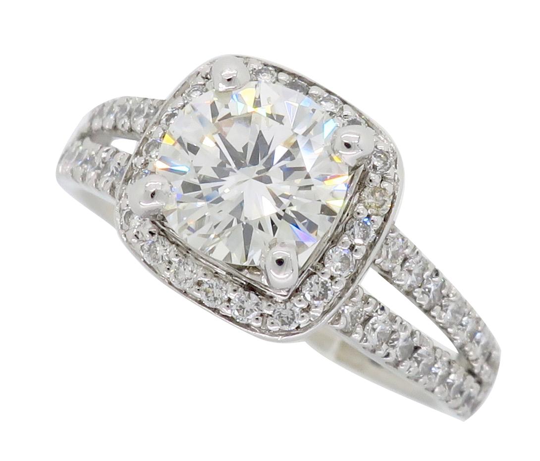 Stunning Scott Kay halo style diamond ring featuring an approximately .97CT Round Brilliant Cut Diamond. 

Designer: Scott Kay
Center Diamond Carat Weight: Approximately .97CT
Center Diamond Cut: Round Brilliant
Center Diamond Color: I
Center
