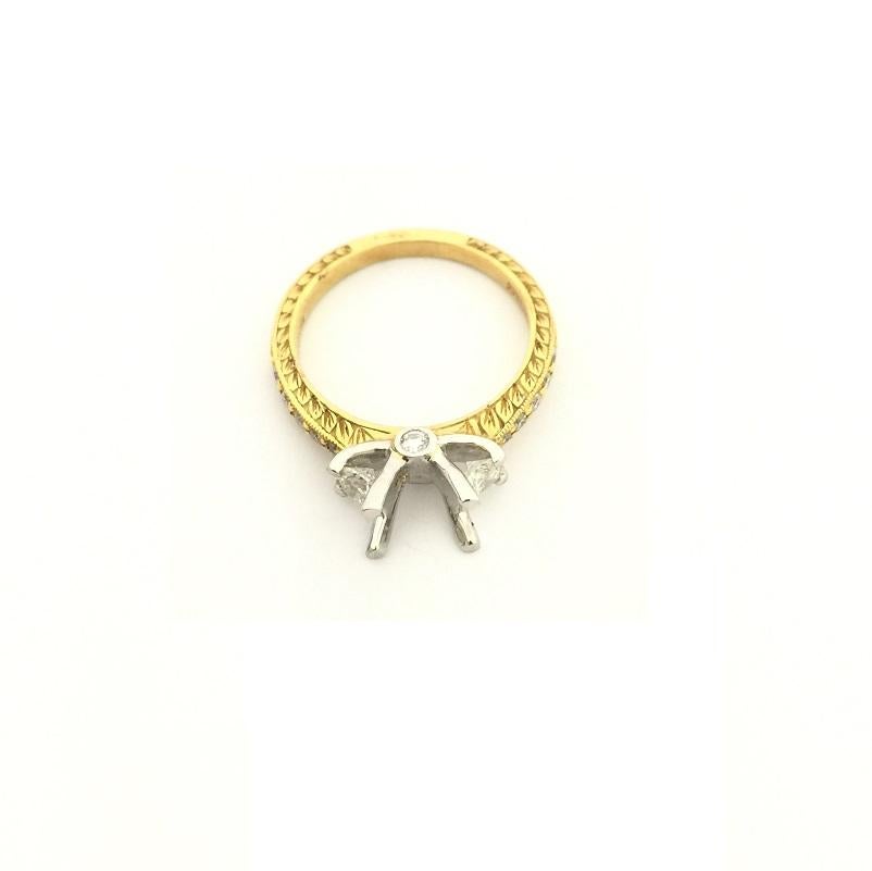 Engaste de diamantes Scott Kay para señora en oro amarillo de 19k y platino
Diamantes de 0,59 quilates de peso total
Anillo talla 6 3/4
M1107RD10FP