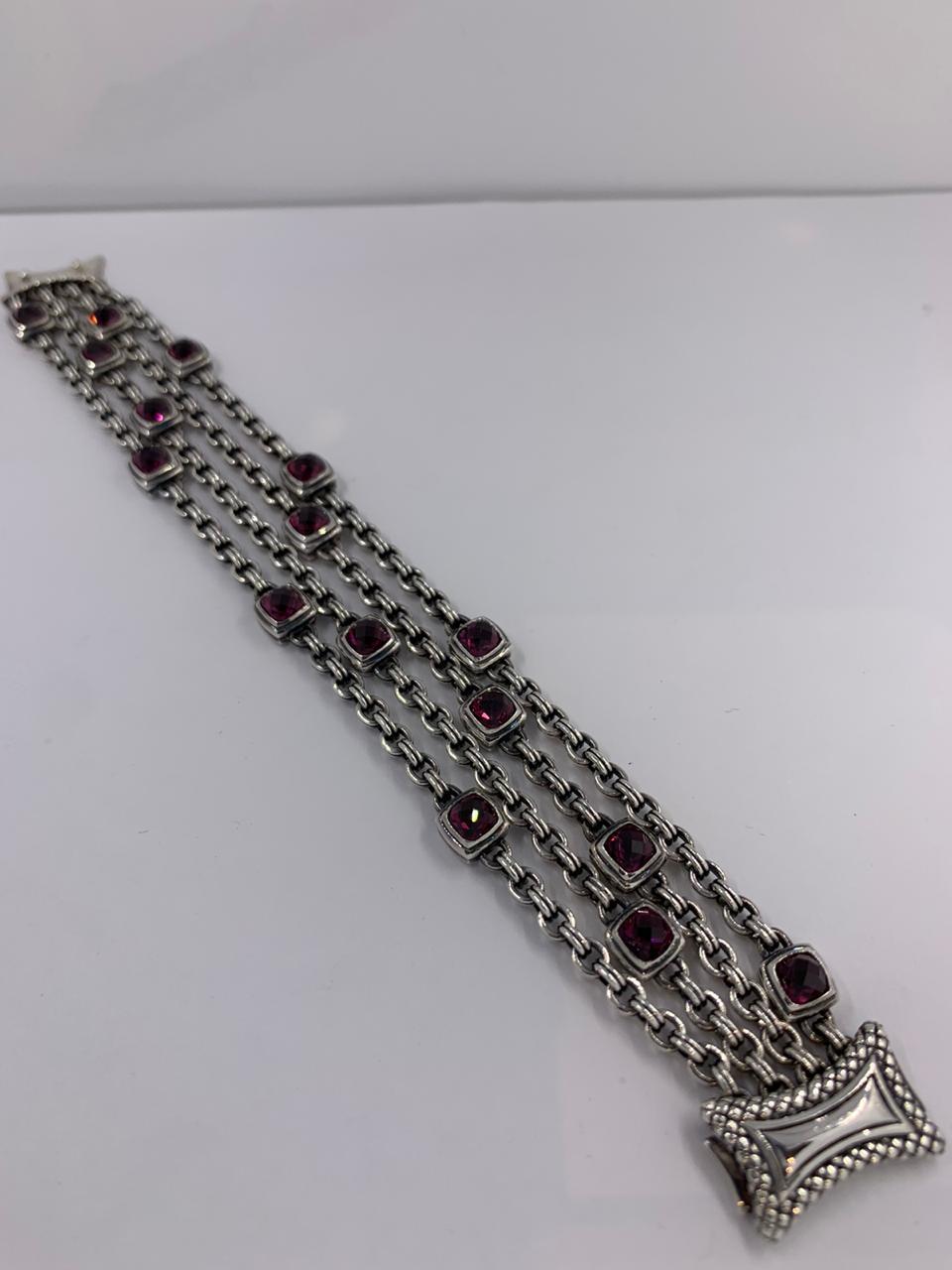Scott Kay Silver Bracelet
4 row silver with garnet link bracelet
SKS-10050