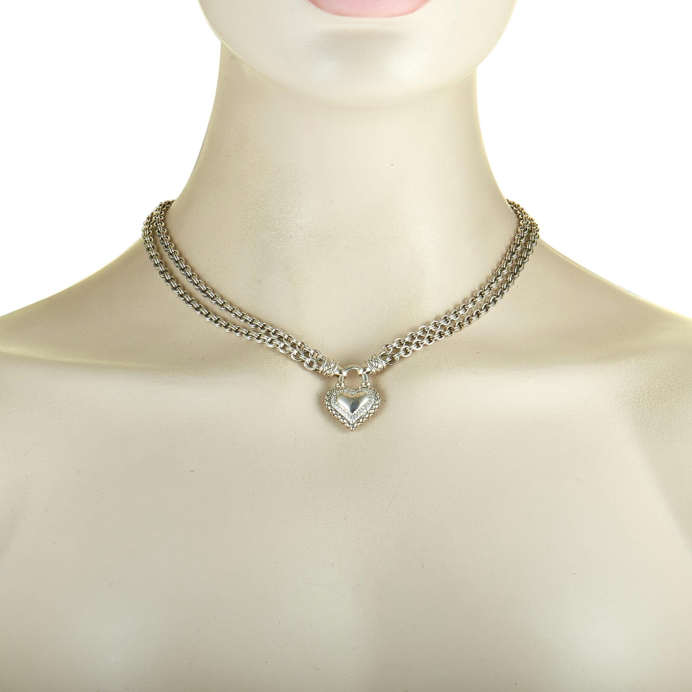 This Scott Kay necklace is made out of sterling silver and diamonds that amount to 0.15 carats. The necklace weighs 54.5 grams and measures 17” in length, boasting a 1” by 0.75” heart pendant.

Offered in brand new condition, this jewelry piece