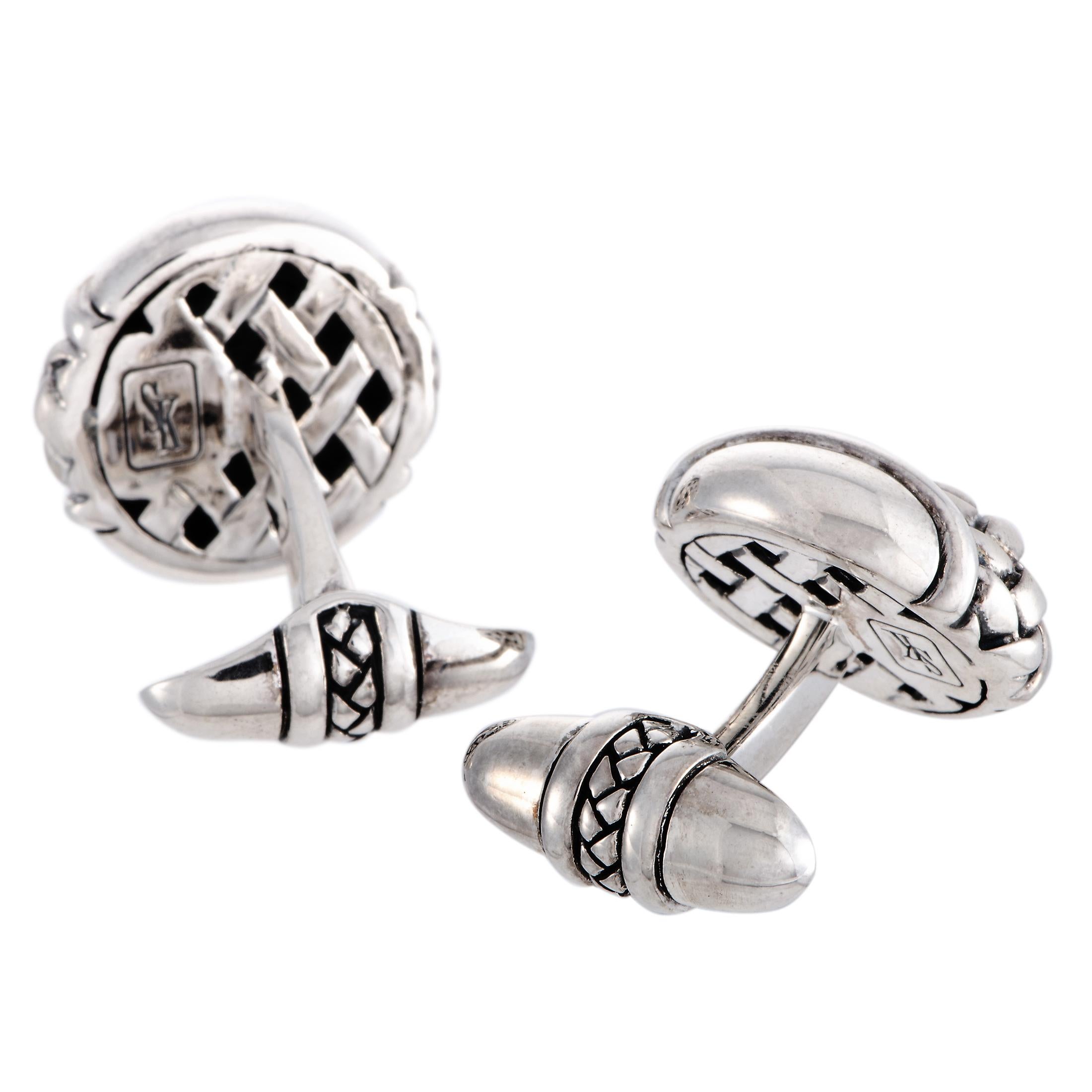 These Scott Kay cufflinks are crafted from sterling silver and each of the two weighs 10.35 grams. The cufflinks measure 0.75” in length and 0.75” in width.

Offered in brand new condition, this pair of cufflinks includes a gift box.