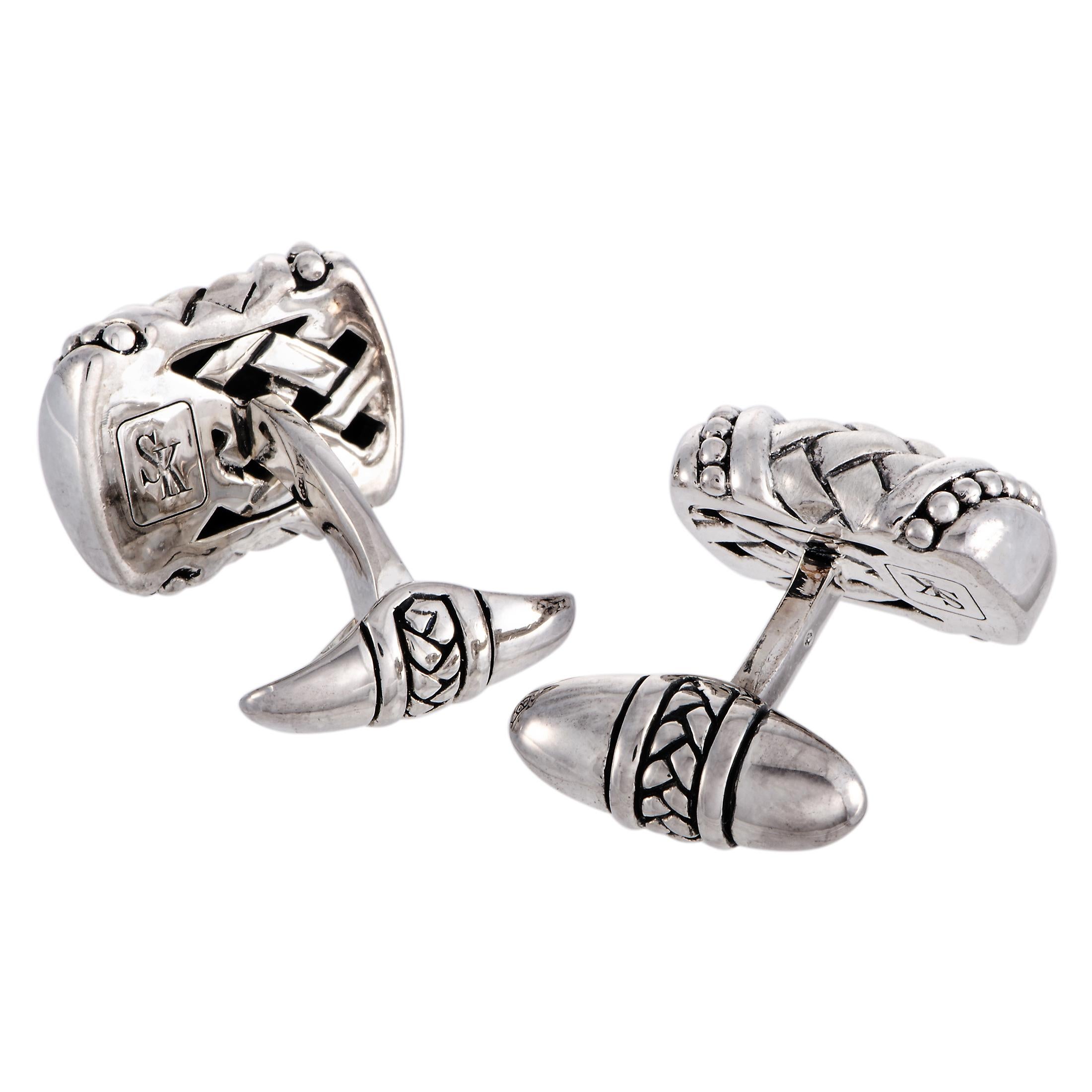 These Scott Kay cufflinks are crafted from sterling silver and each of the two weighs 10.15 grams. The cufflinks measure 0.75” in length and 0.55” in width.

Offered in brand new condition, this pair of cufflinks includes a gift box.