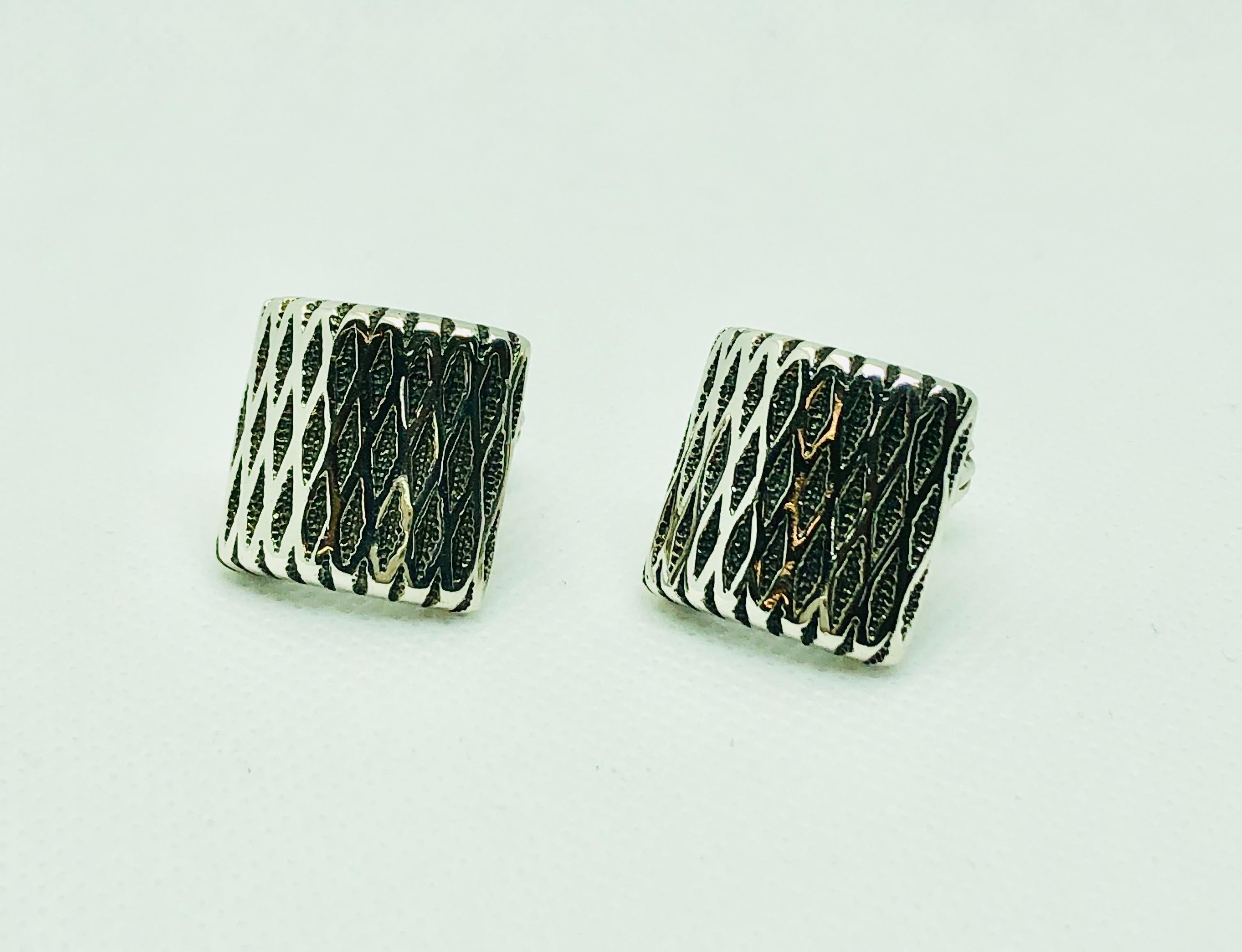 Scott Kay Sterling Silver Cufflinks. This set has an arched square with a handsome woven pattern and are stamped 