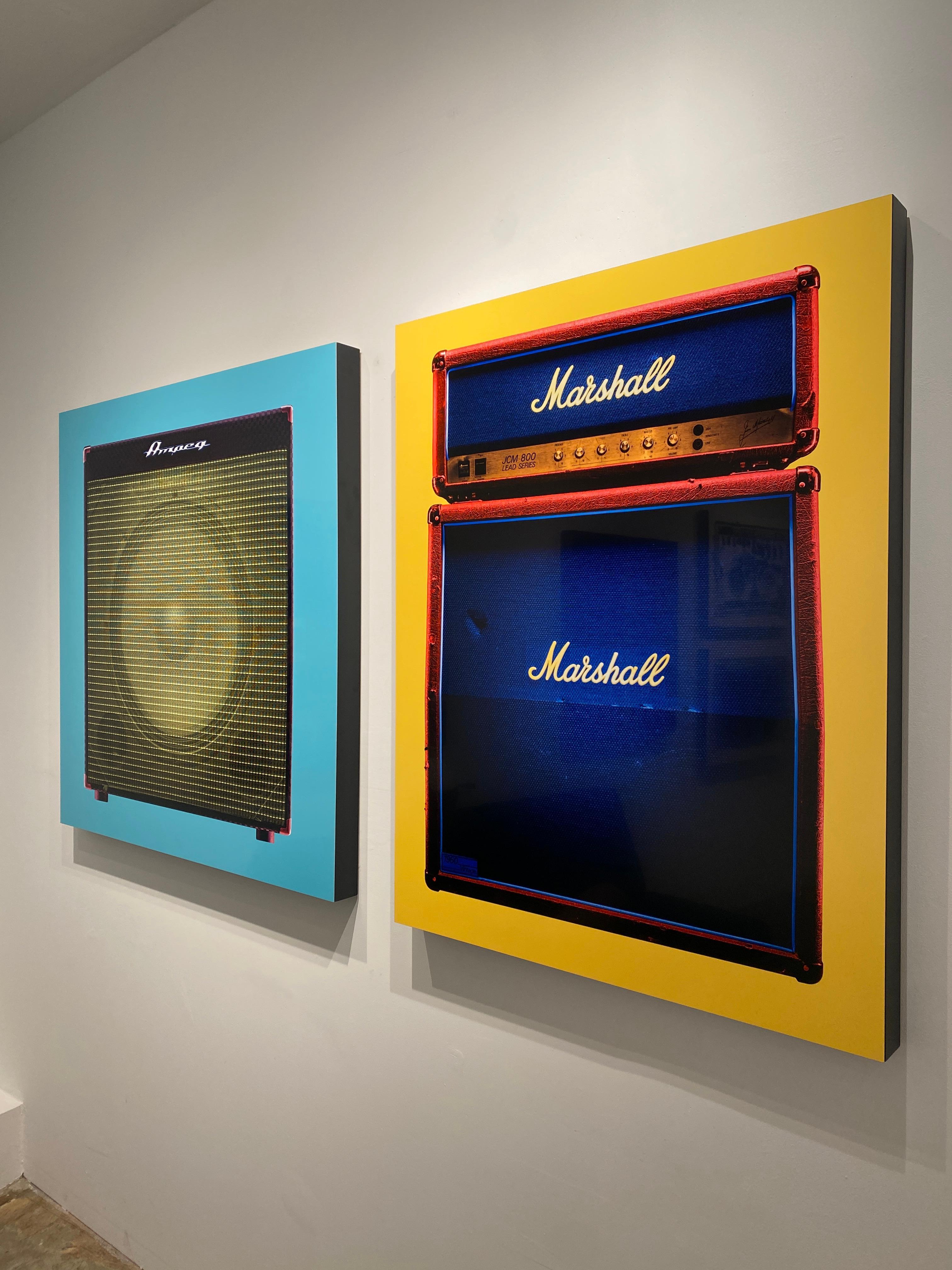 “Marshall JMC 800” is a powerful statement piece from Scott McDermott’s celebrated Backline series—a visual love letter to rock-and-roll culture. This large-format photograph transforms the iconic Marshall amplifier into an object of sculptural