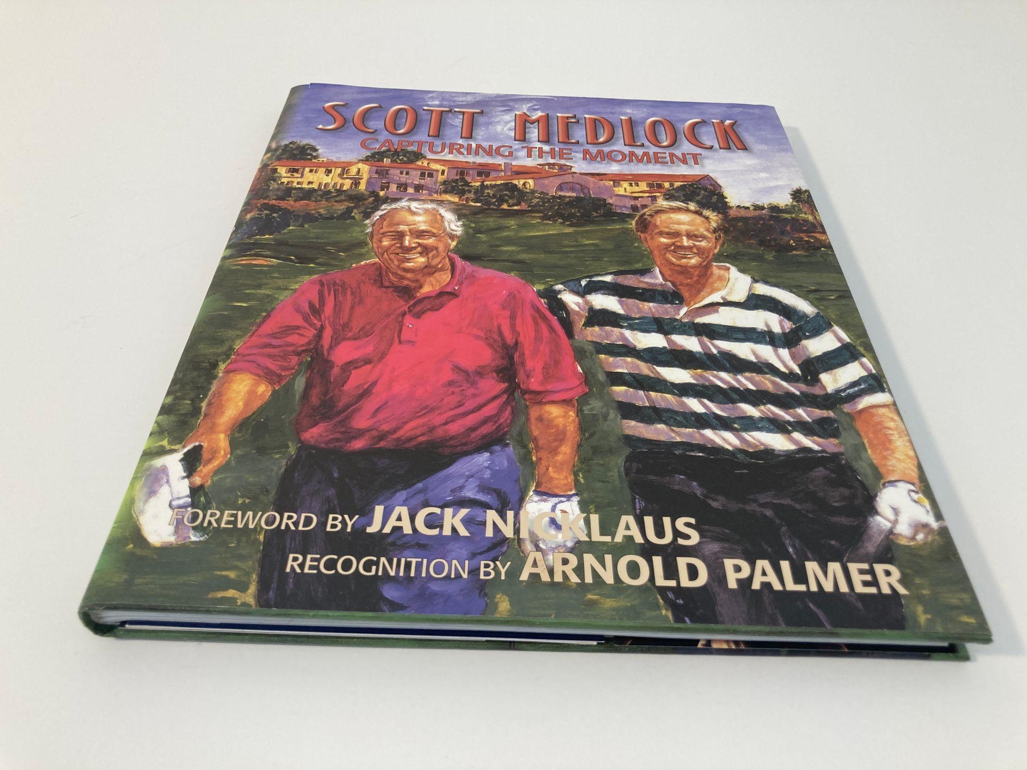 Scott Medlock Capturing the Moment Hardcover Book 2010. Book is signed and autographed by SCOTT MEDLOCK.
As one of the worlds foremost artists, Scott Medlock has teamed with and painted many of the greatest names in sports history including golf