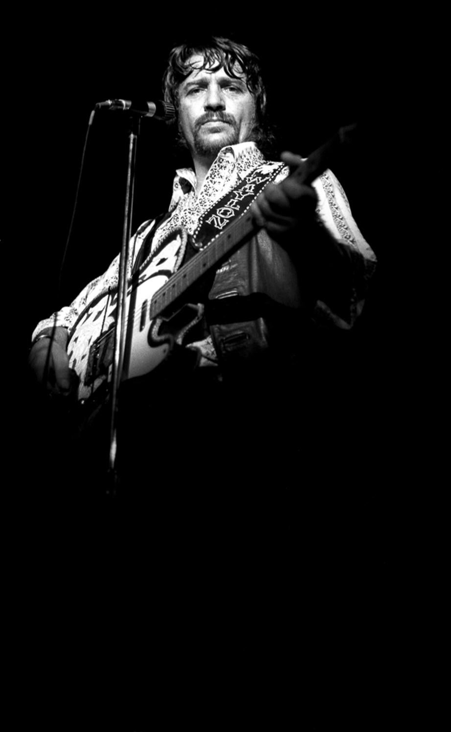 Scott Newton Black and White Photograph - Waylon Jennings at The Armadillo, Austin 1974