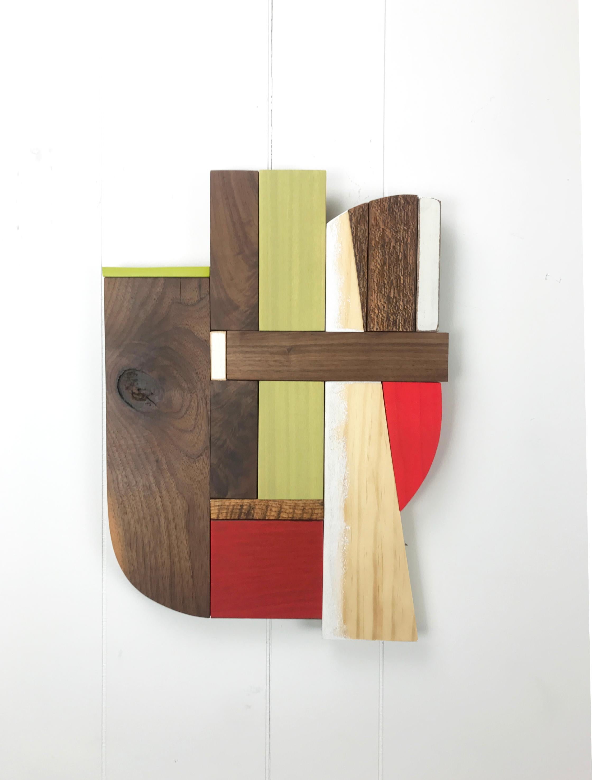 <p>Artist Comments<br />This is a bold but intimate wall sculpture that commands attention in any room.  It is constructed of repurposed mahogany, walnut, pine, oak and poplar woods and finished with tung oil and acrylic.  Form, color and