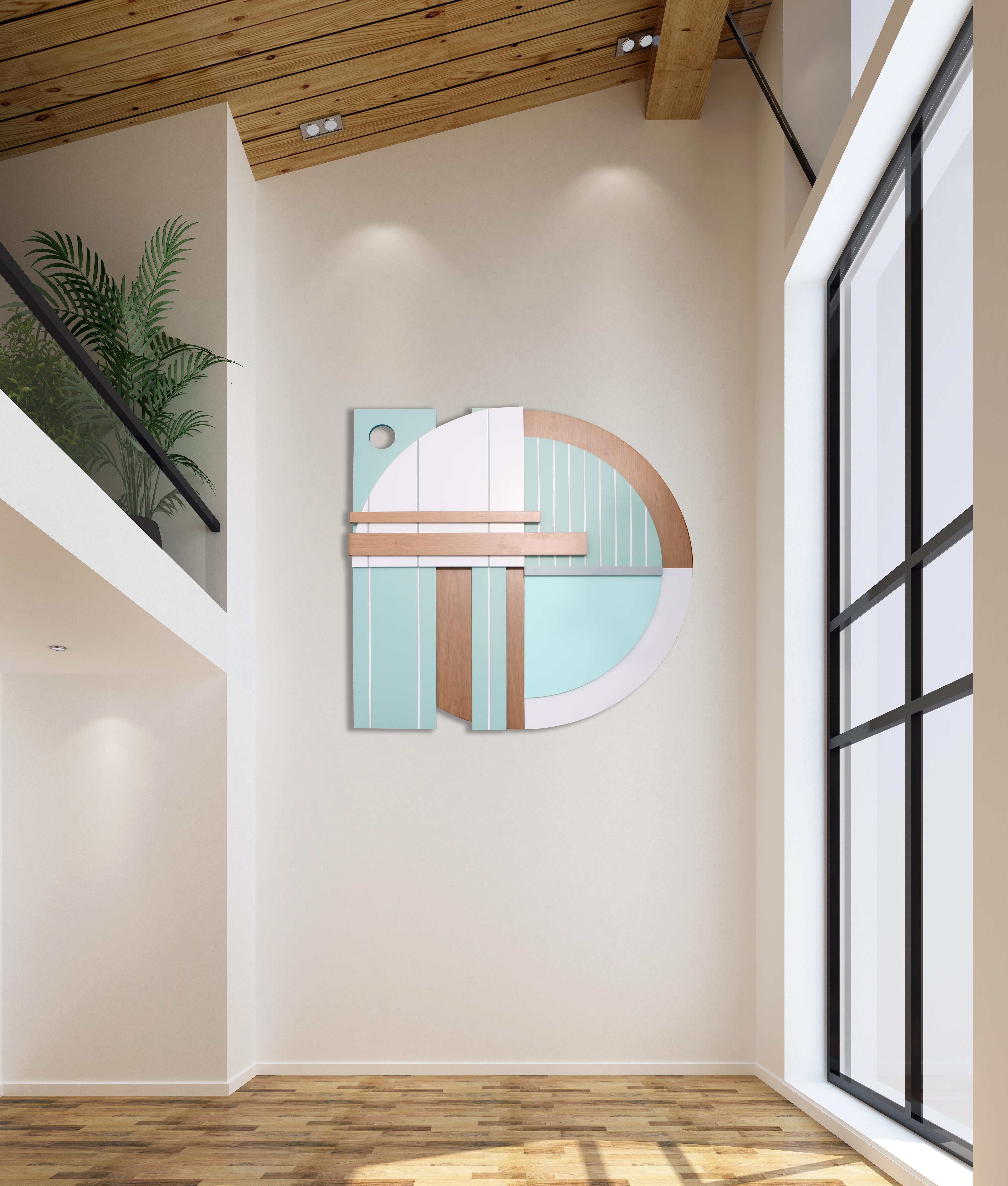 Bauhaus Mint is an elegant modern minimalist contemporary wall sculpture. It is constructed with birch panels, and high end pigmented lacquer with a satin finish. The piece relies on a minimalist color palette that is subtle and refined. Scott was