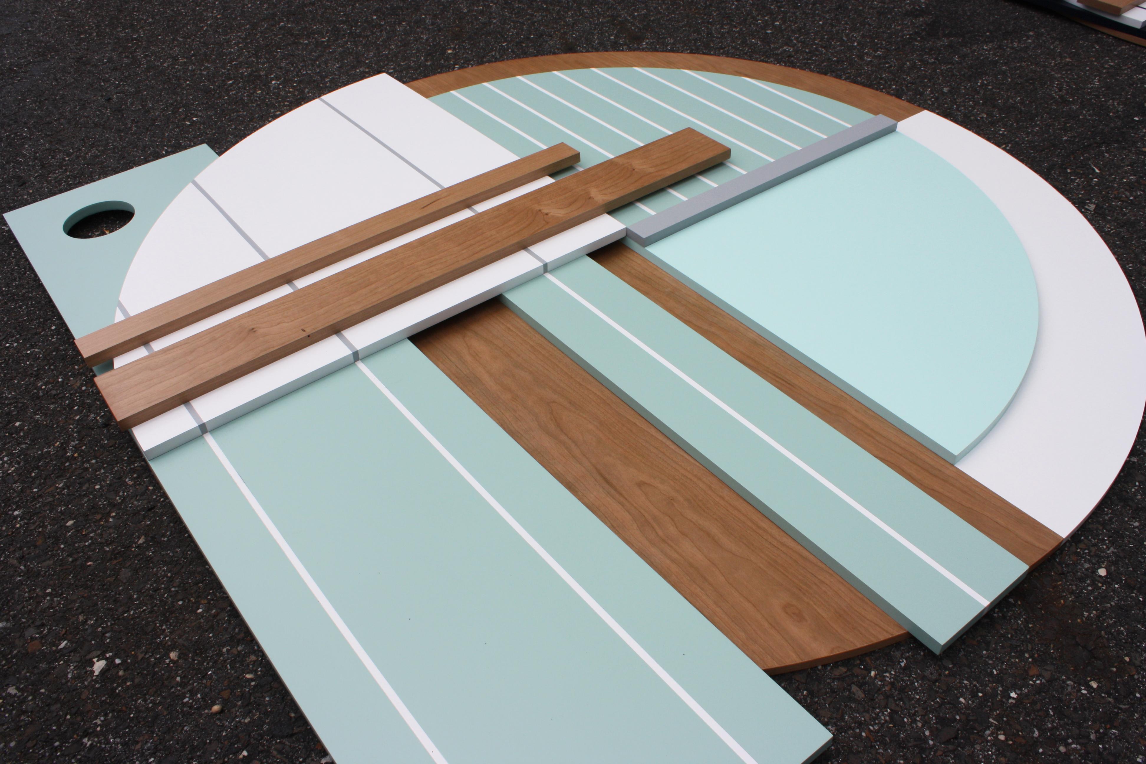 Bauhaus Mint is an elegant modern minimalist contemporary wall sculpture. It is constructed with birch panels, and high end pigmented lacquer with a satin finish. The piece relies on a minimalist color palette that is subtle and refined. Scott was