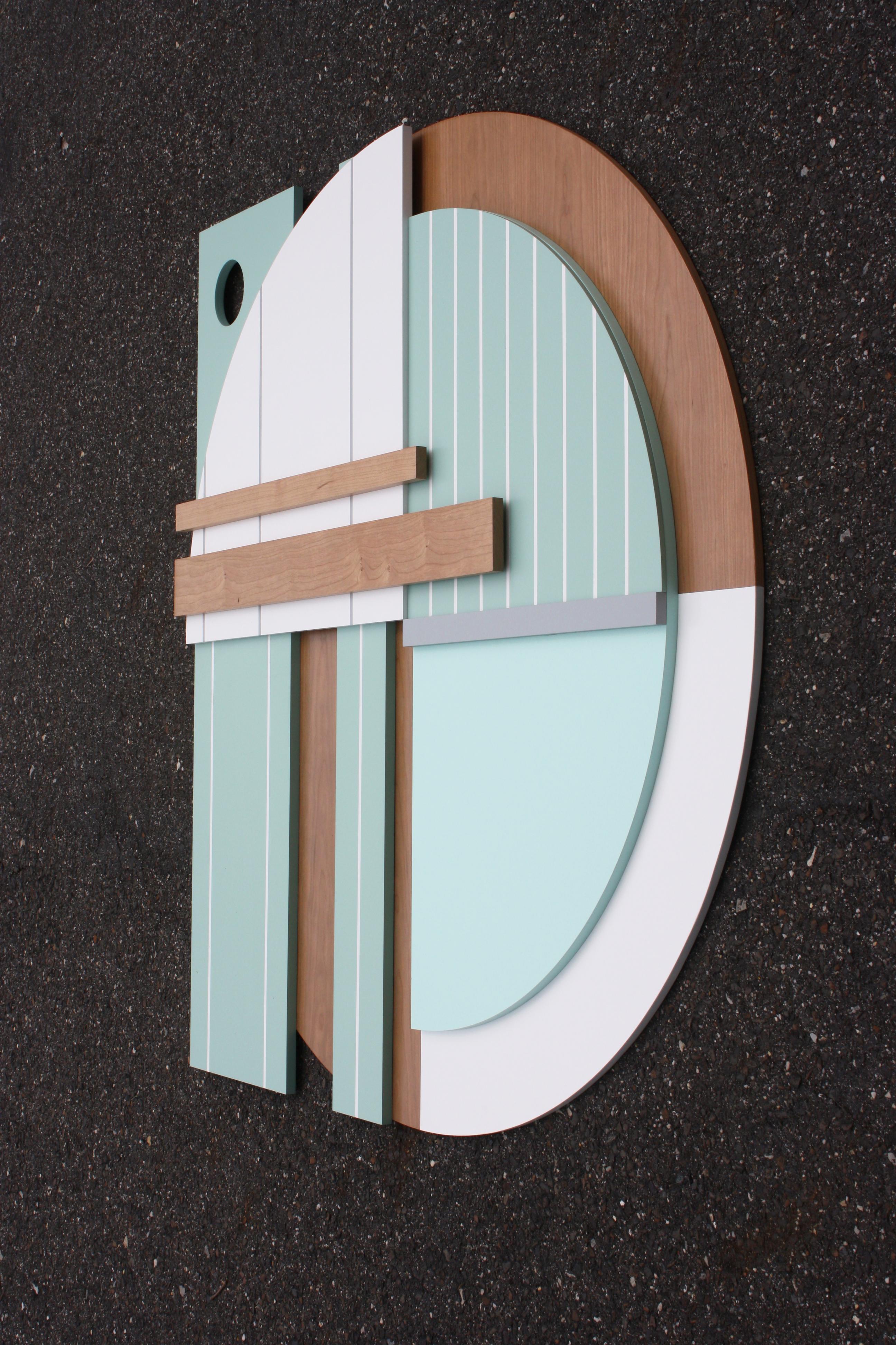 Bauhaus Mint ist eine elegante, moderne, minimalistische, zeitgenössische Wandskulptur. Es besteht aus Birkenpaneelen und einem hochwertigen, pigmentierten Lack mit satinierter Oberfläche. Das Werk basiert auf einer minimalistischen Farbpalette, die